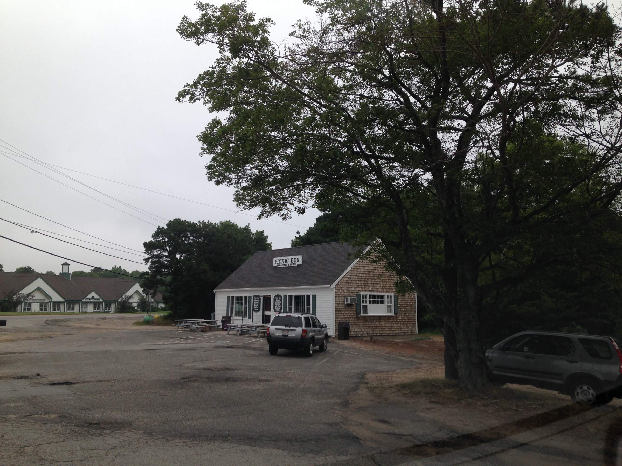 New Seamless Gutters are the finishing touch on the Picnic Box in Mashpee, MA by Gutter Pro Enterprises