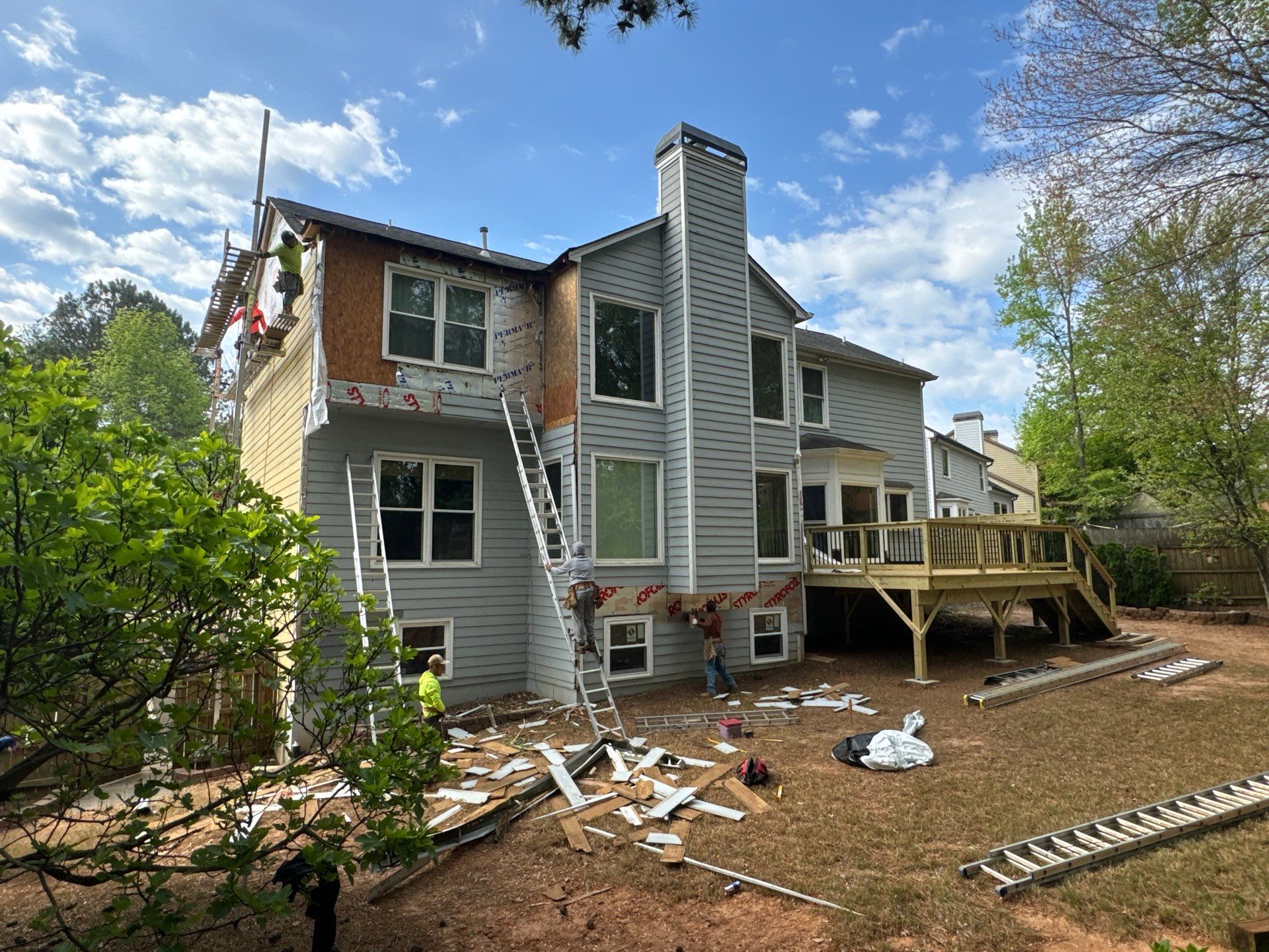 Full Exterior Siding Replacement and Custom Deck in Johns Creek by Swift Home Renovations 