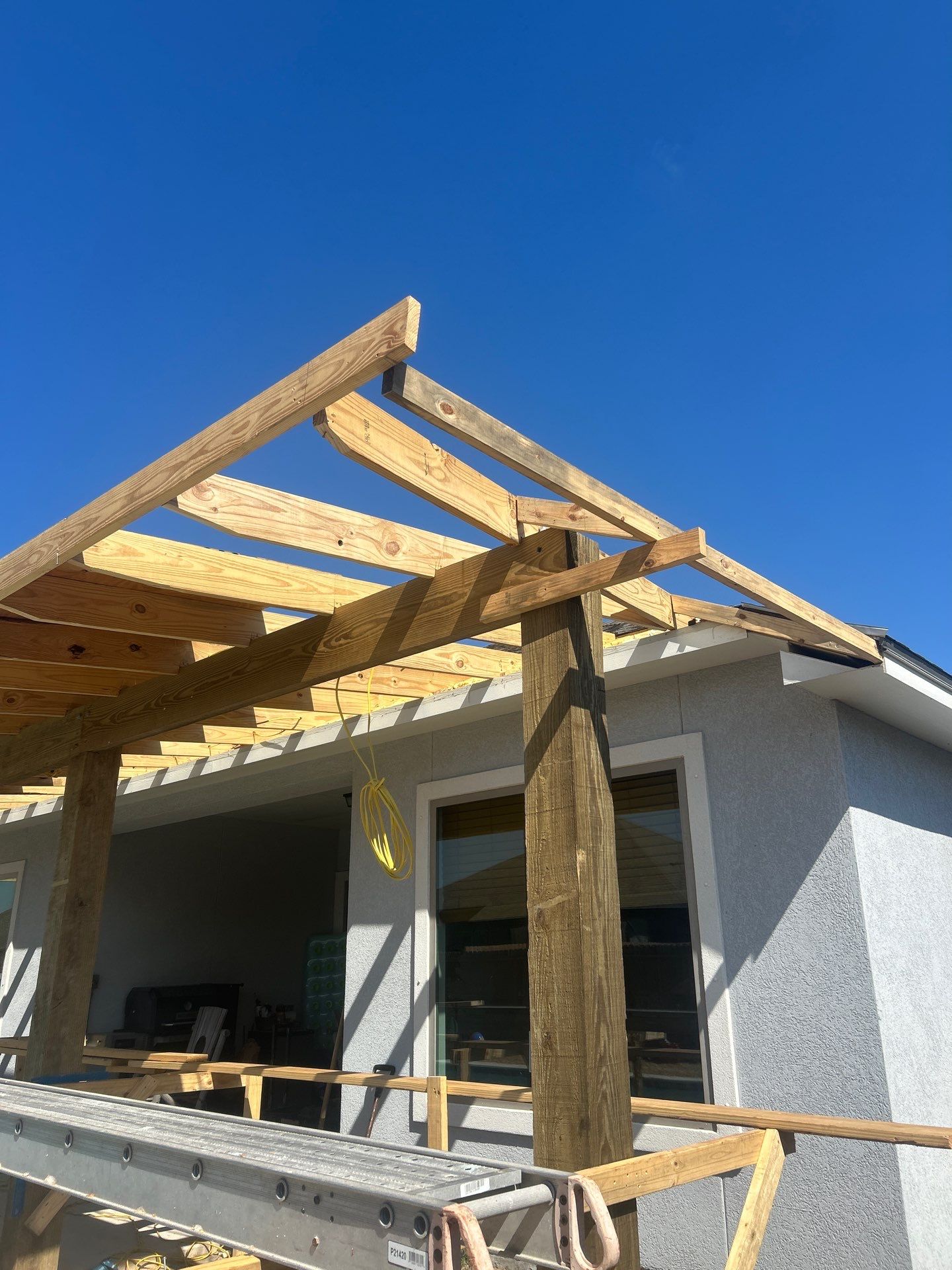 Patio Pool Cover by Bayfront Roofing and Construction