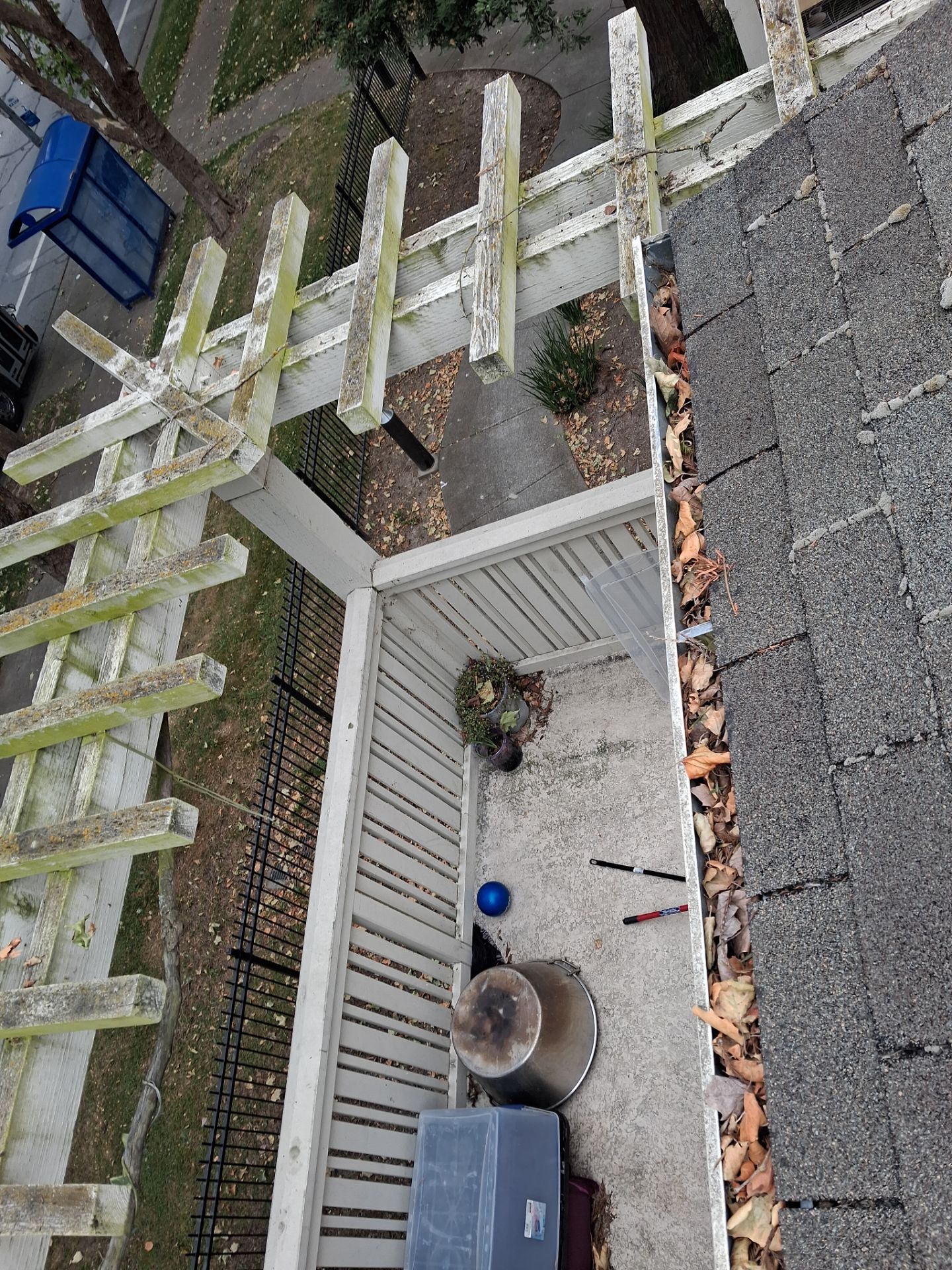 Commercial gutter cleaning Santa Rosa before photo with filled gutters