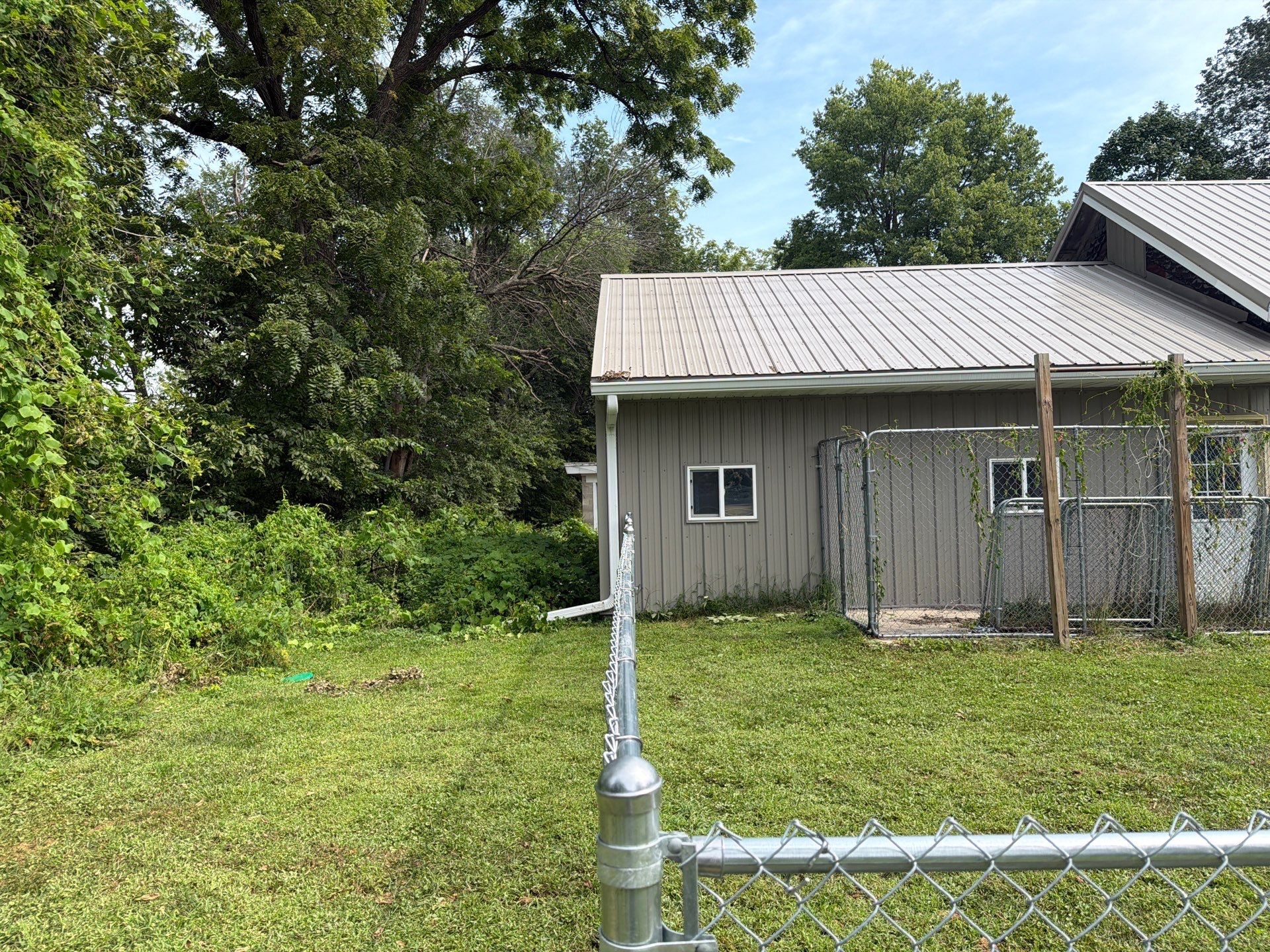 Galvanized Chain Link Fence and Gate Installation in La Porte City by Perfect Picket Fence and Stain