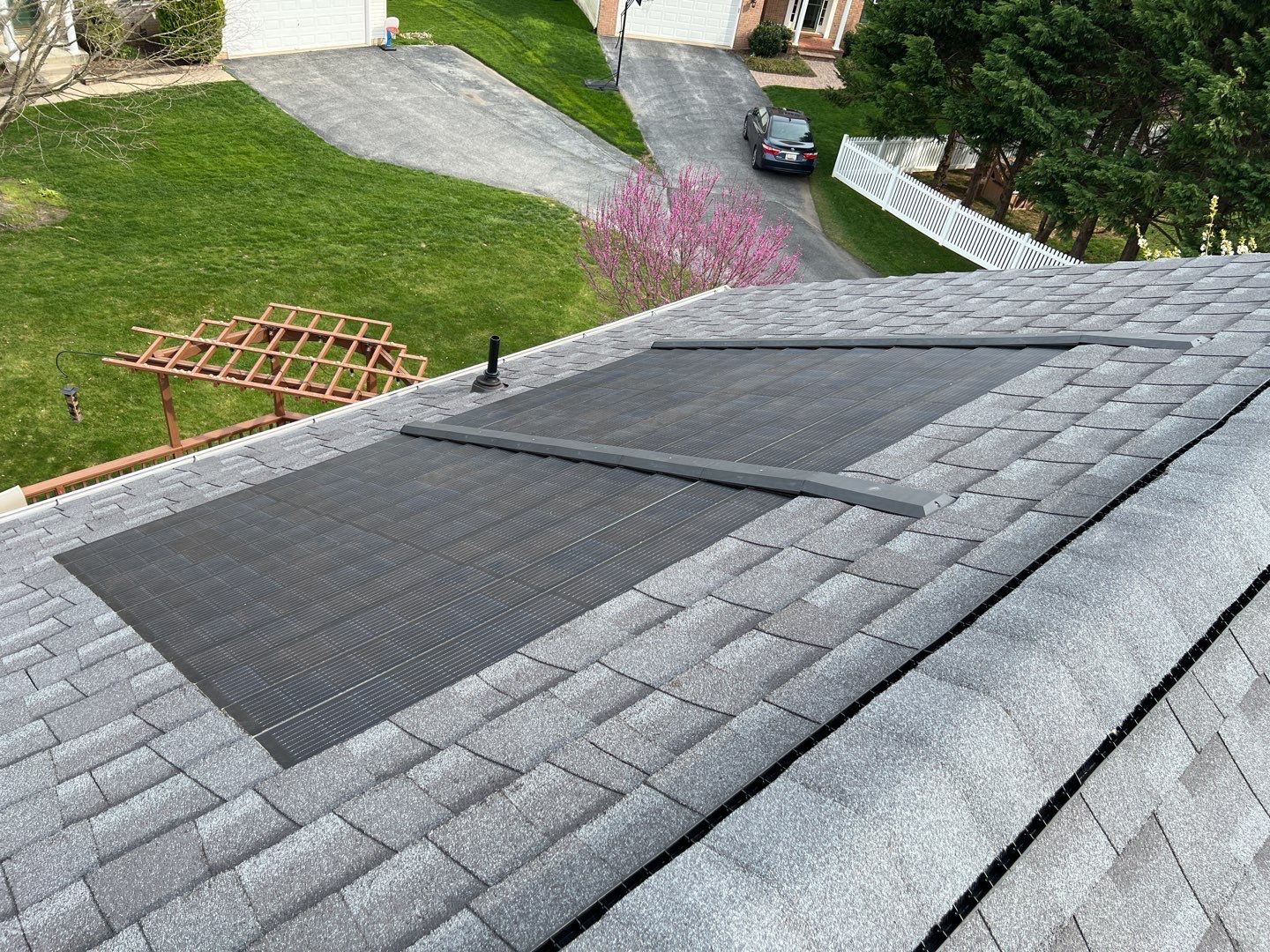 Solar Roof Replacement using GAF Timberline Solar Shingles by American Home Contractors