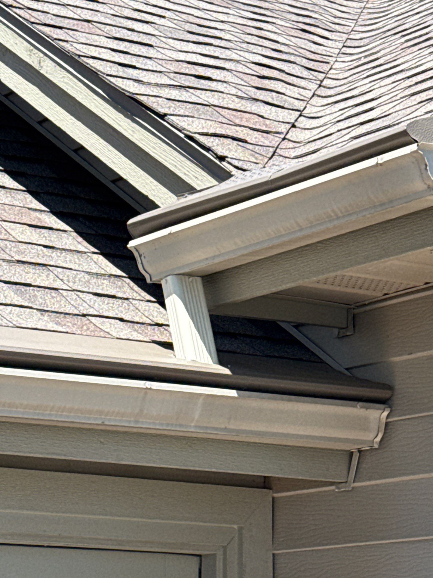 Custom Gutter Helmet Protection for Residential Roof in Suttons Bay by Rainbow Seamless Systems