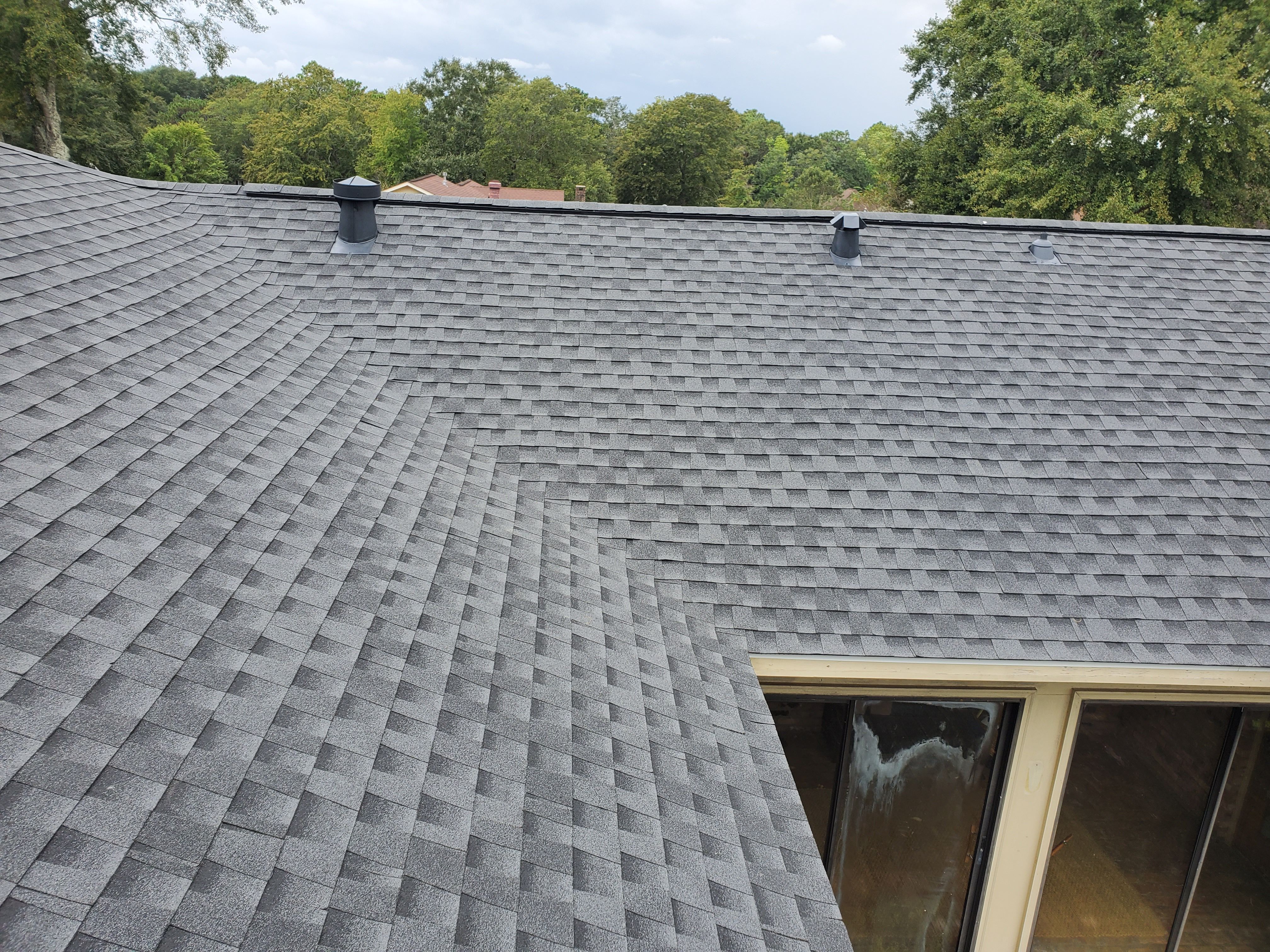 Residential Roofing Installation using Roof Replacement by American Roofing & Construction LLC