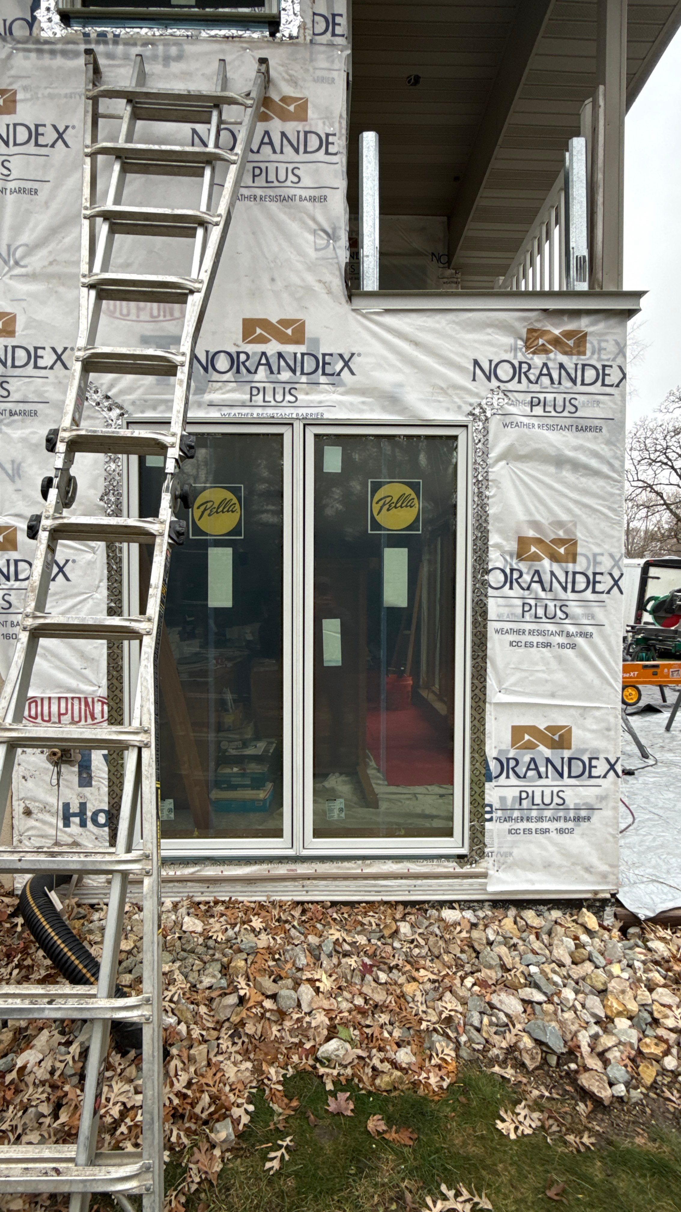 A Clean Window Upgrade Ready for New Siding with Pella Lifestyle Series by United Windows and Siding LLC