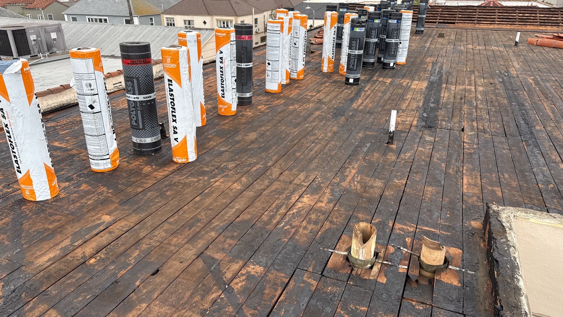 Apartment Building Reroofing using Polyfresko® G Highly Reflective Modified Bitumen Cap Sheet by Hull Brothers Roofing
