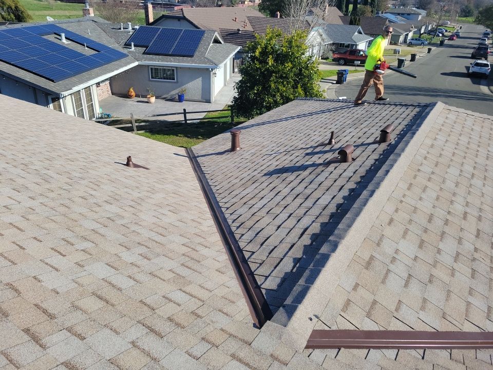Roofing and Gutters to protect this home by Byers Enterprises