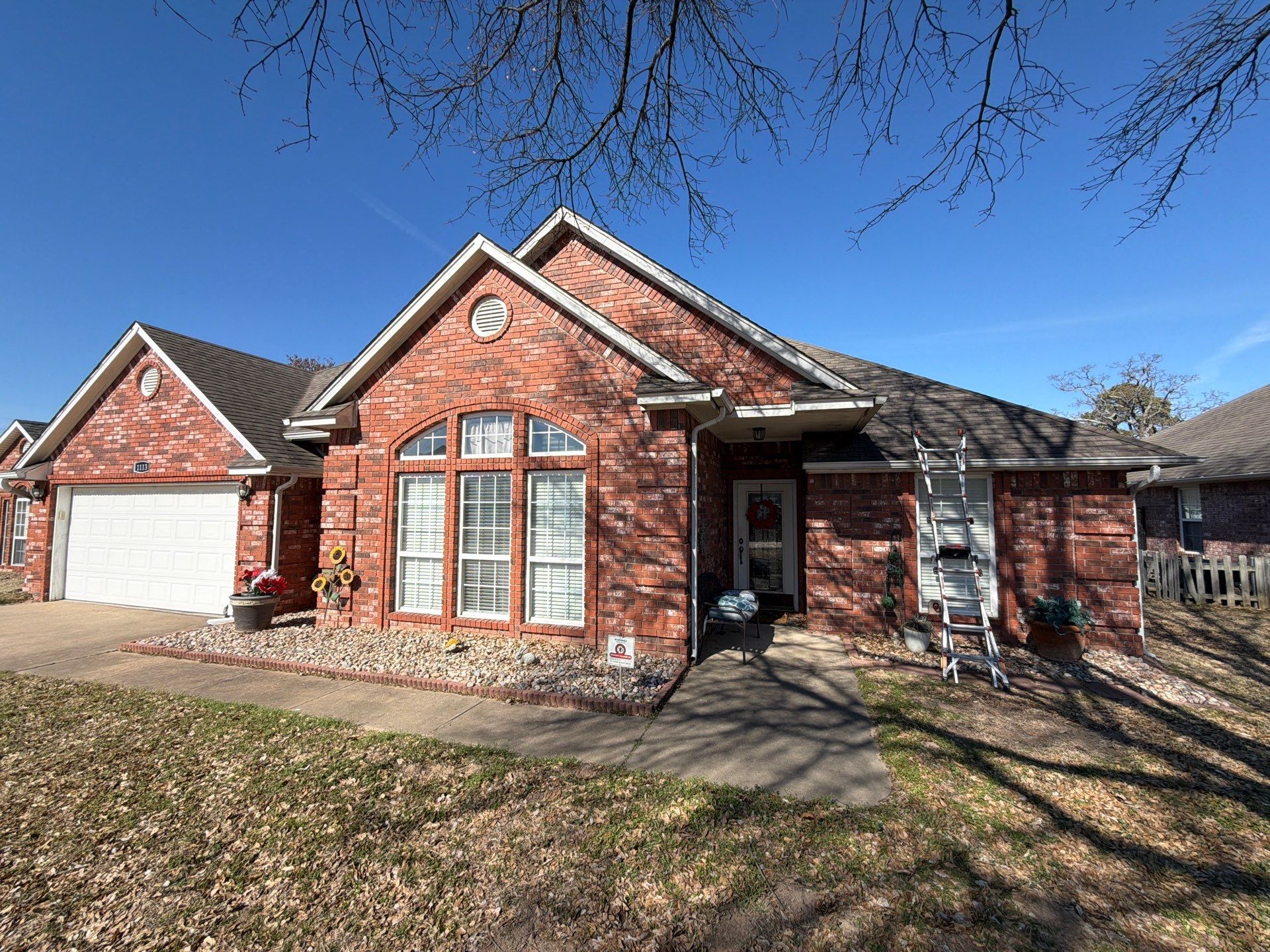 Black roof & gutters!! by In & Out Construction & Remodeling, LLC