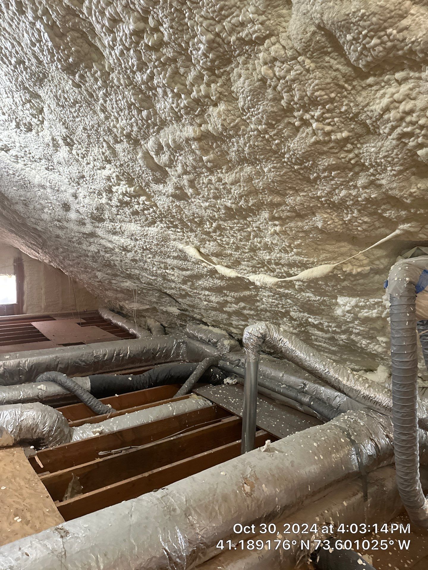 Attic Insulation using open cell spray foam by NYS Foam & Energy