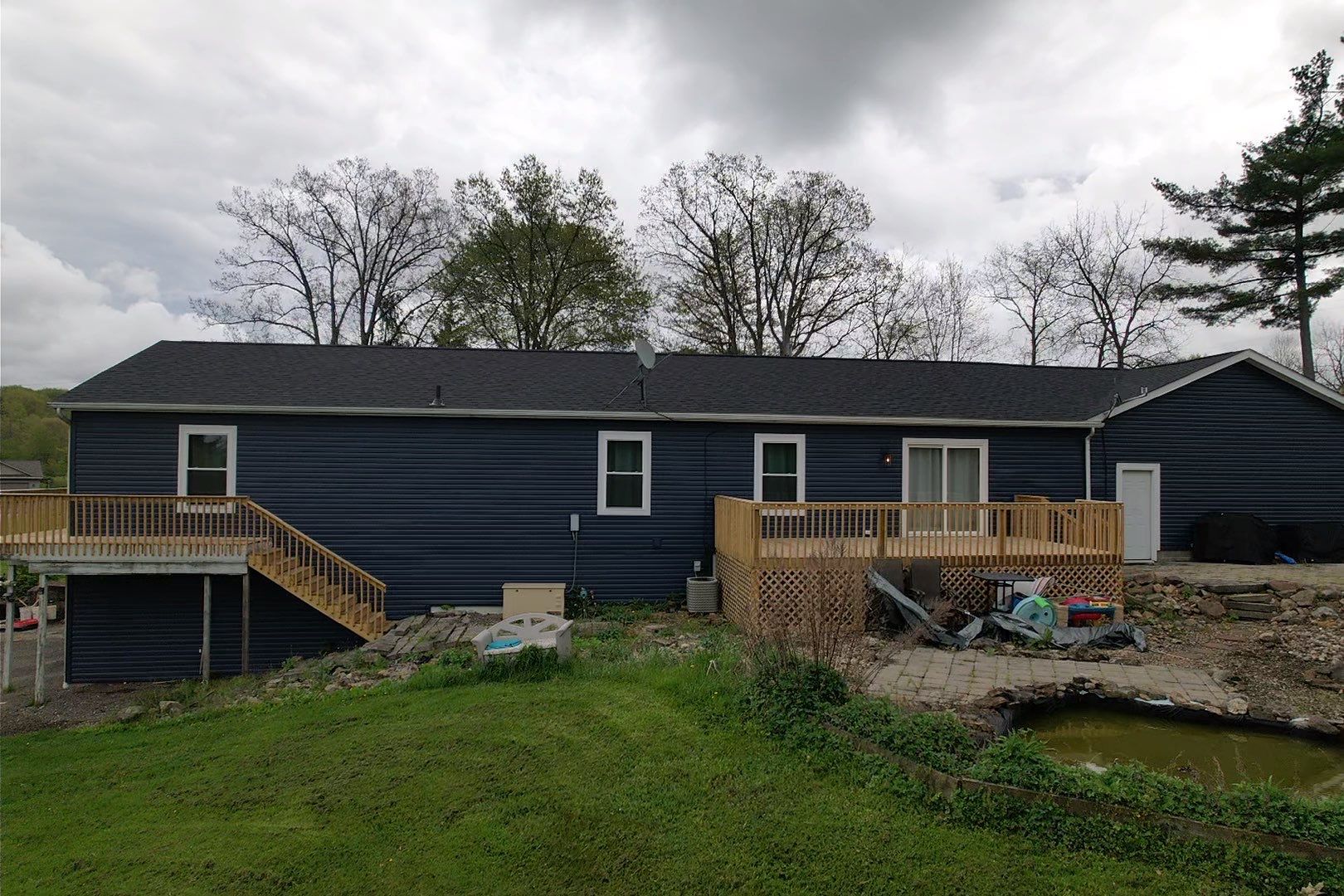 Dundee, Ohio Shingle Roof, Siding, Stone and Deck Installation by Pine Ridge Roofing LLC