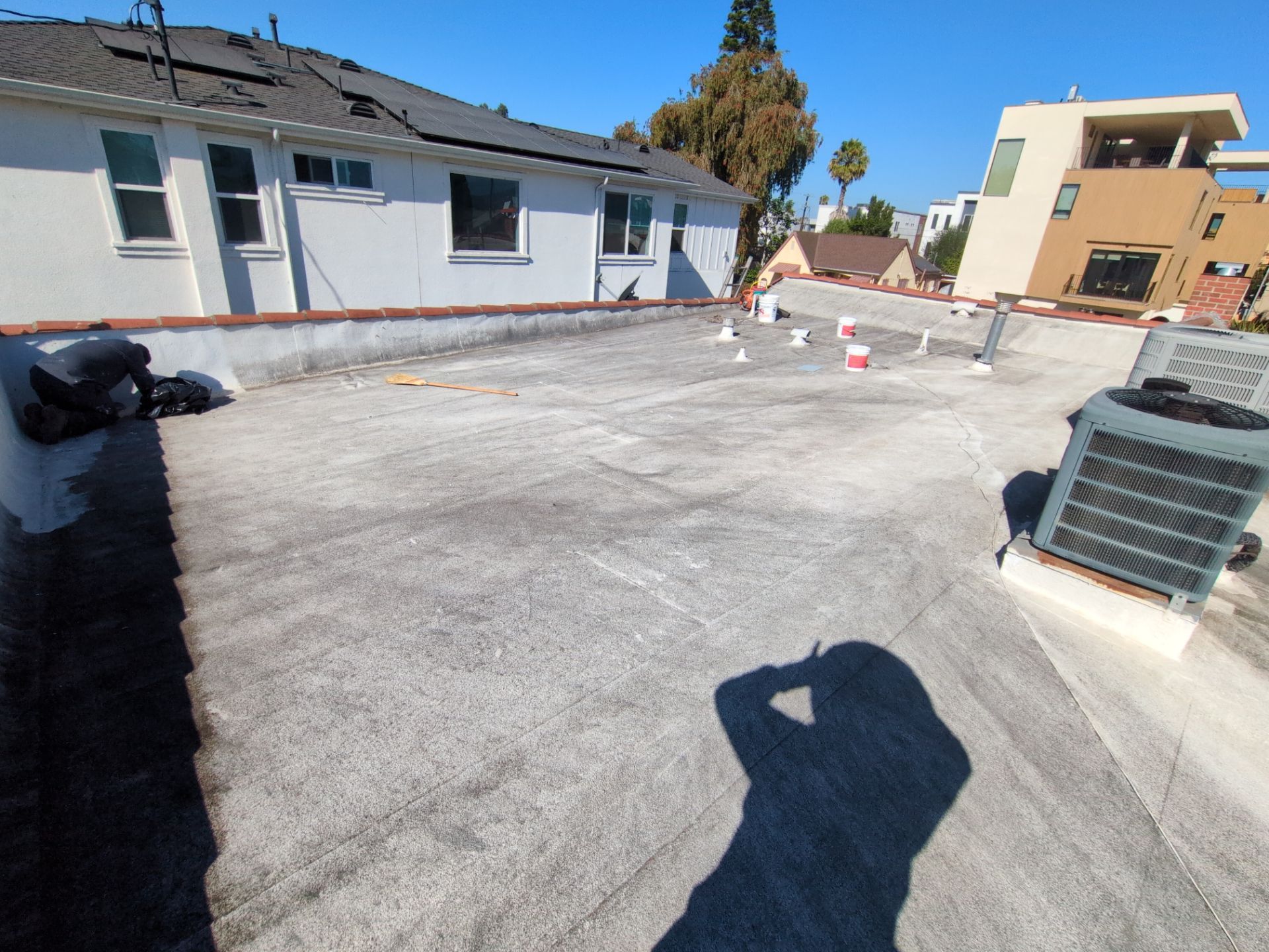 Los Angeles Flat Roof Restoration with White Reflective Coating by Hull Brothers Roofing
