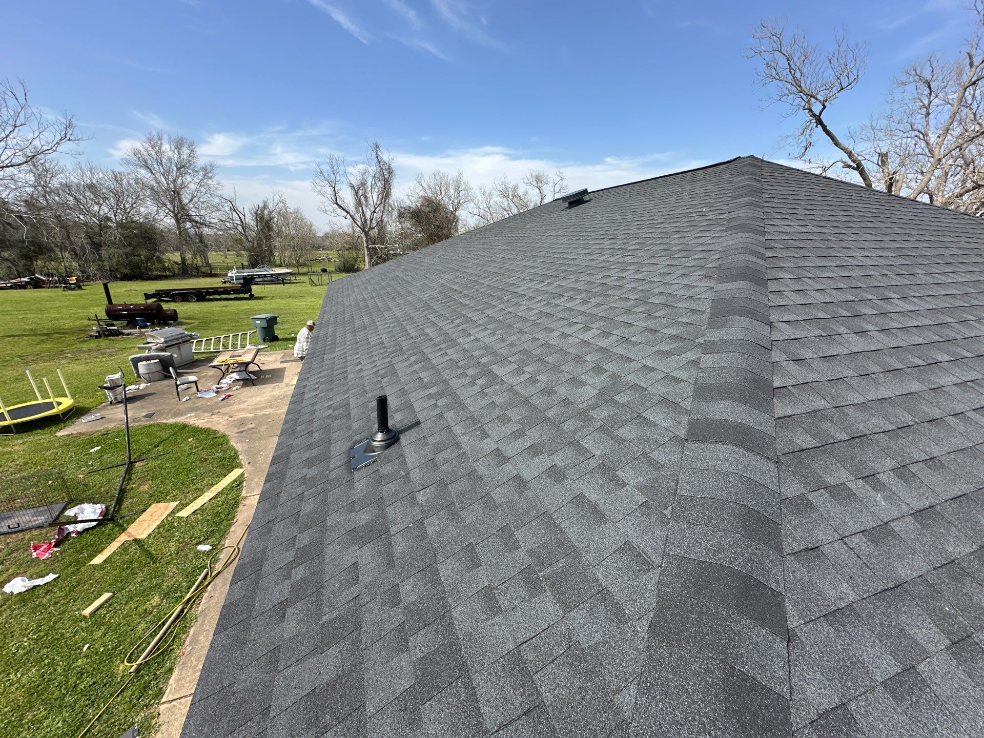 Residential Roofing Installation using GAF Timberline Night Shadow (NS) by Motion Roofing