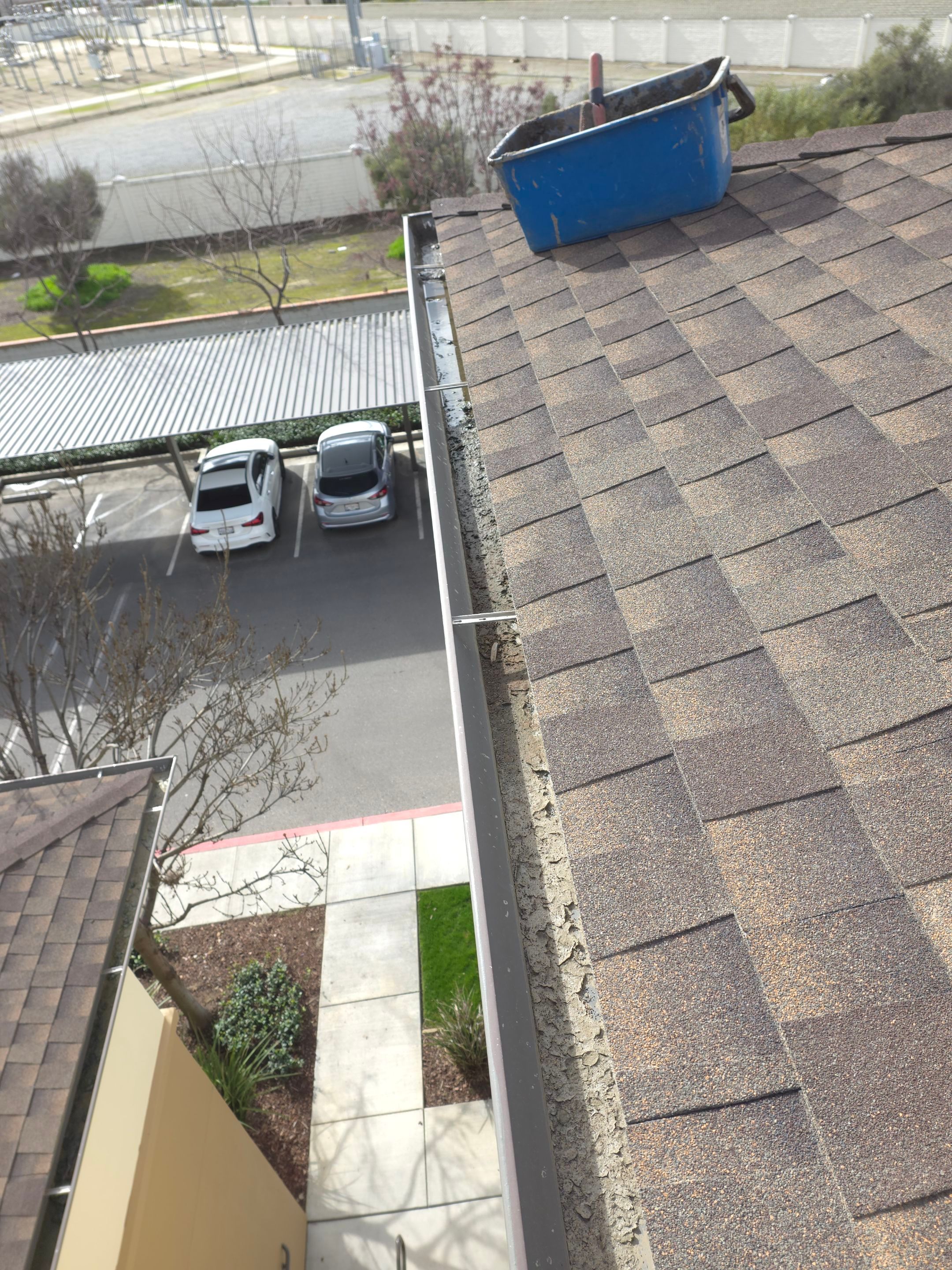 HOA gutter cleaning before photo