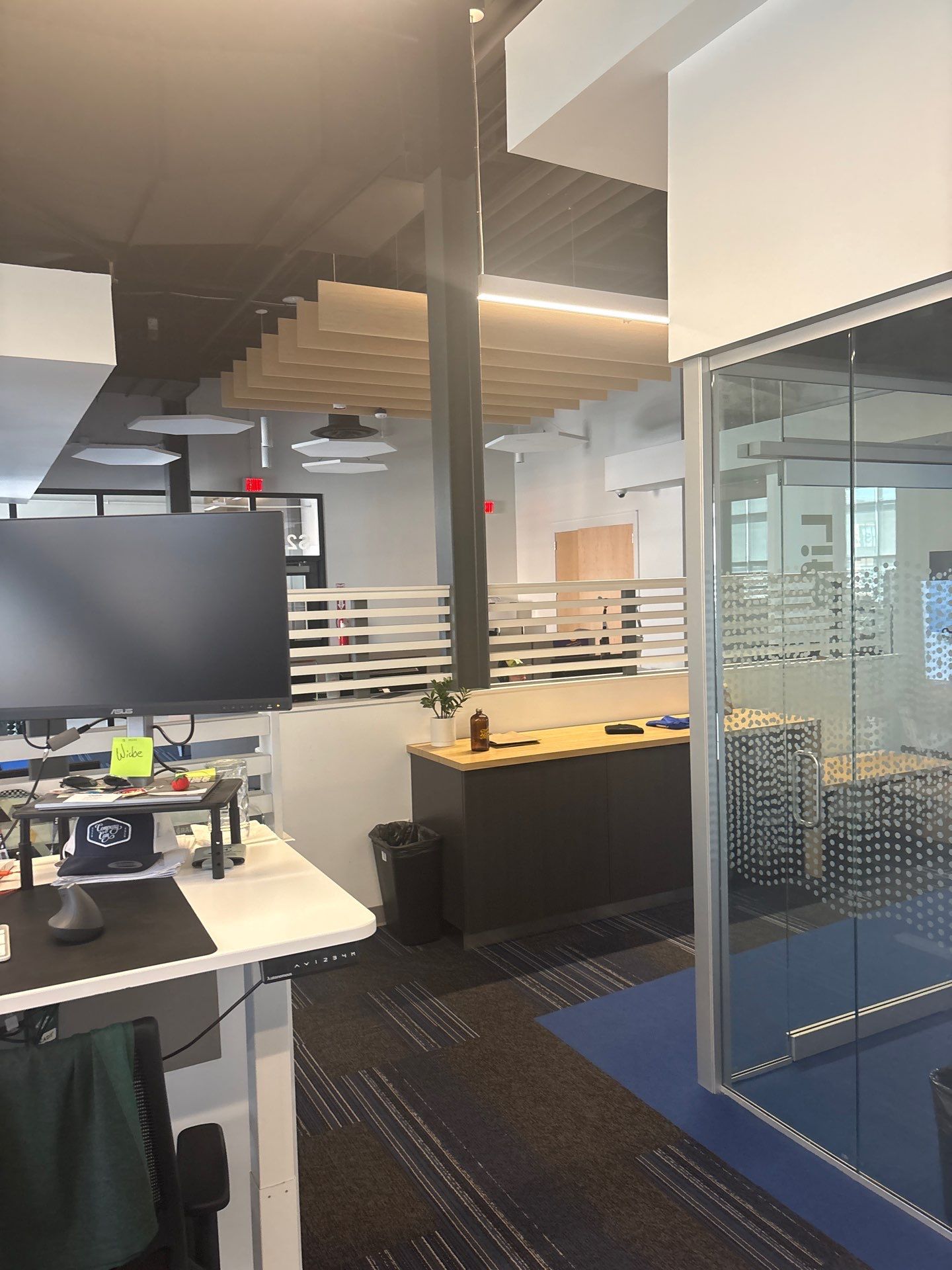 Lincoln Office Interior Remodel with Acoustic Baffles and Glass Walls by CompanyCam Sales Demo