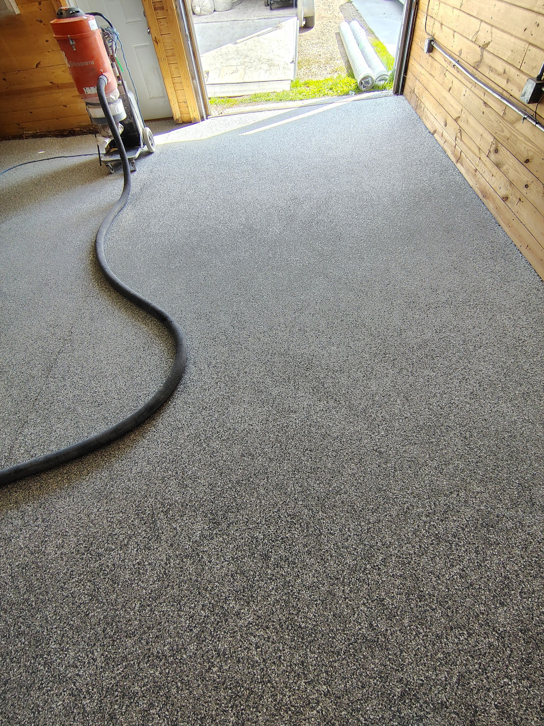 Commercial Epoxy Flake Floor Coating in Emmetsburg, Iowa by Select Painting, Coatings & Garage Cabinets
