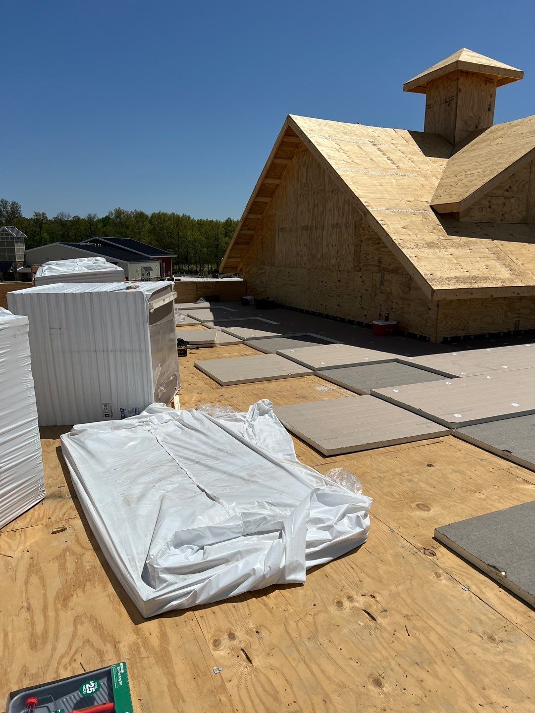Commercial Roofing Installation using 60 mil rubber roof  by Nitro Roofing and Construction