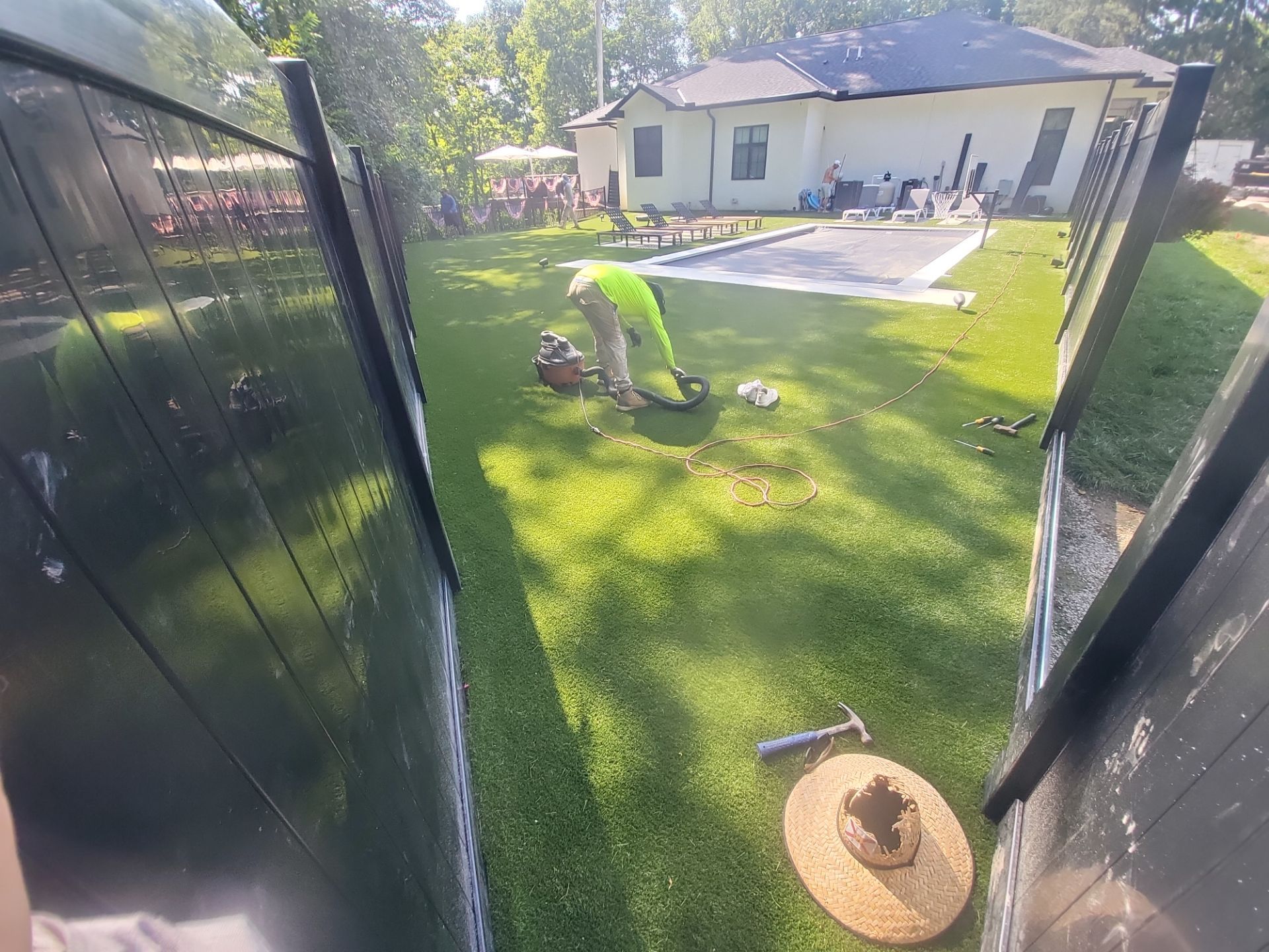 High-End Residential Turf Surrounding Pool in Powell by Southwest Greens Midwest
