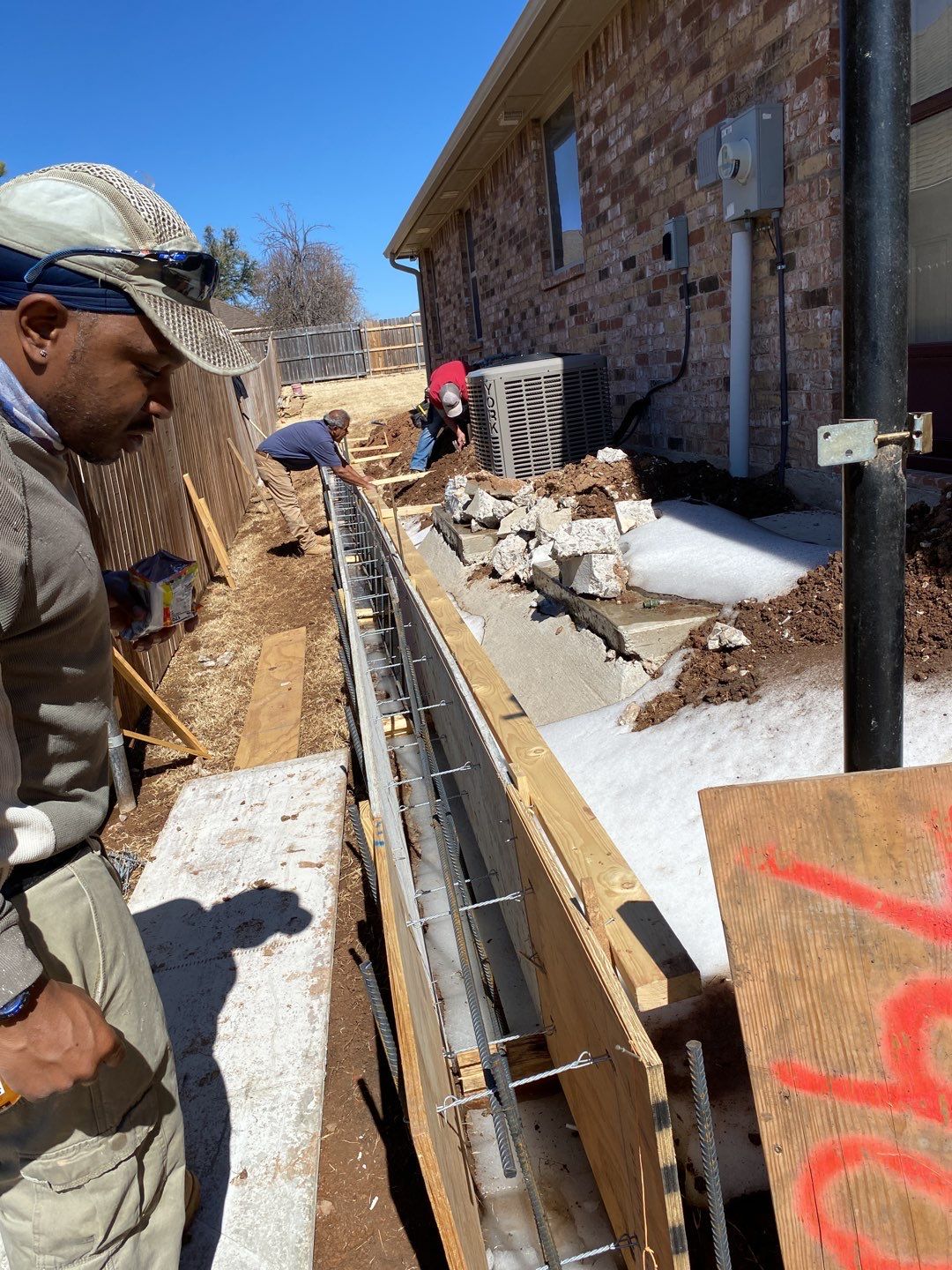 Concrete Slab , Retaining Wall , Fence, and landscape. by Clays Services Inc