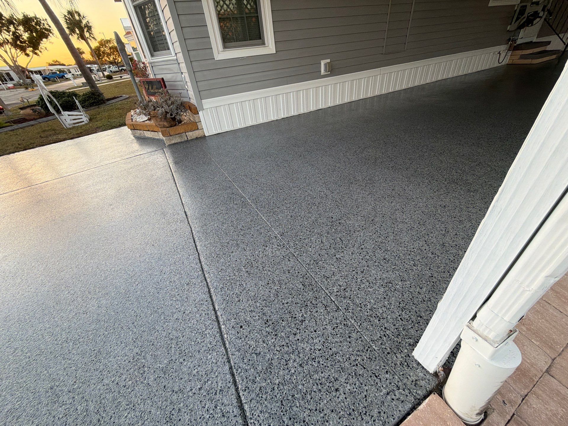 Driveway Transformation: Nightfall Flake System with Full UV & Moisture Protection by Performance Floors & Coating
