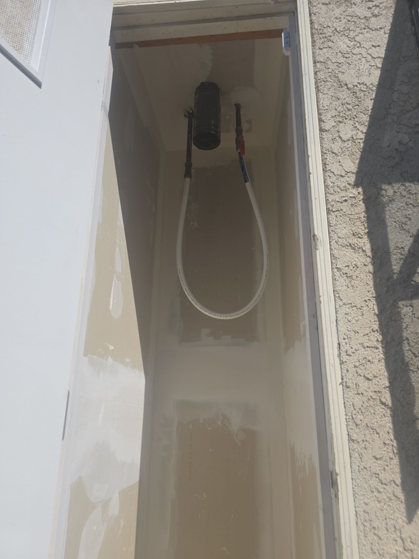 Water Heater Installation and Outside Piping by Us Plumbing