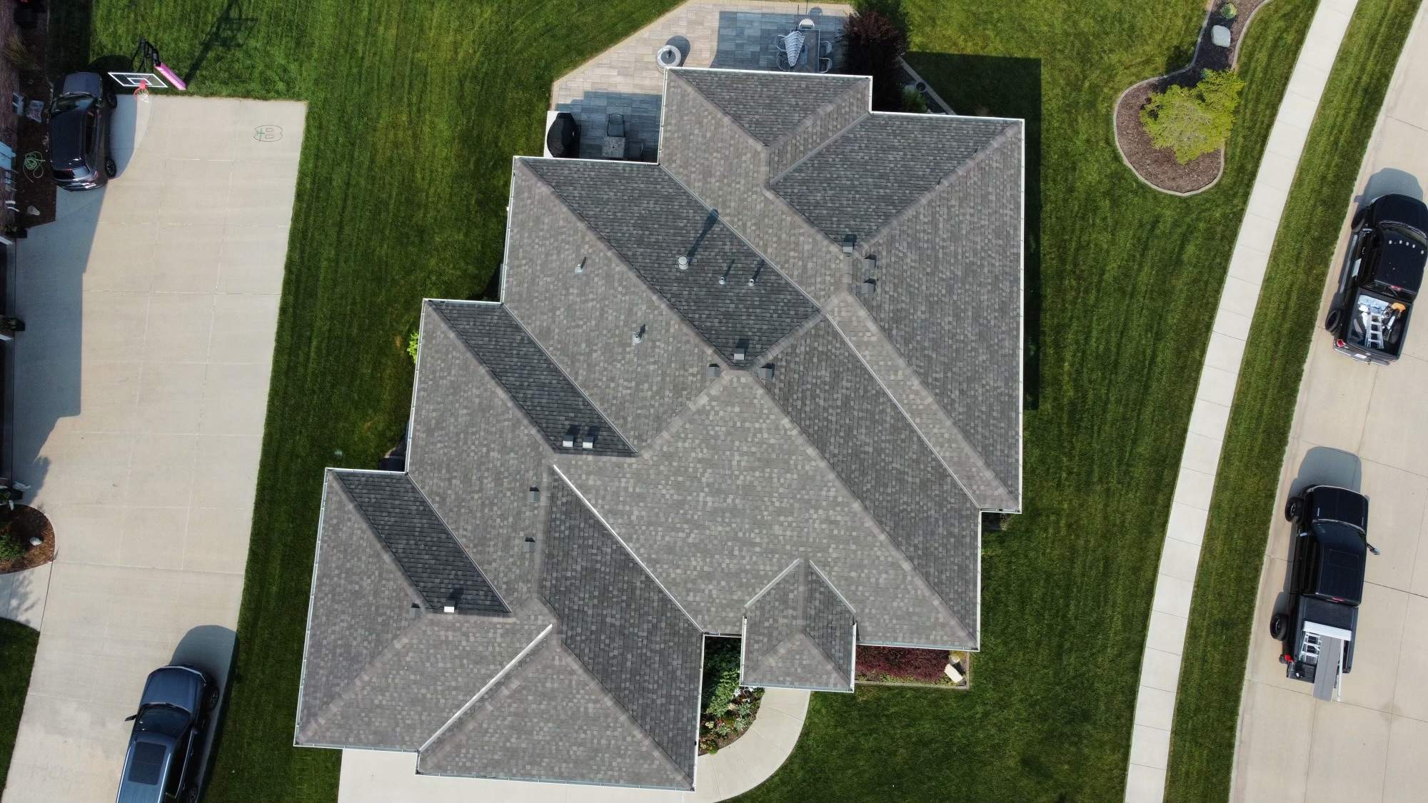 Residential Roofing Installation using TAMKO TITAN WEATHERED WOOD by Lightning Exteriors