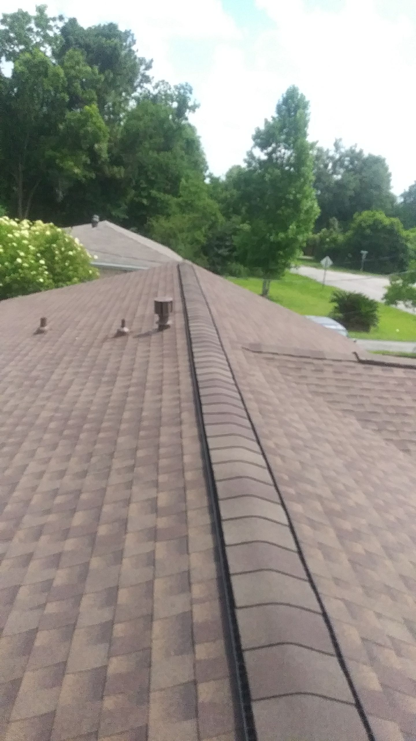Residential Roofing Installation using Roof Replacement by American Roofing & Construction LLC