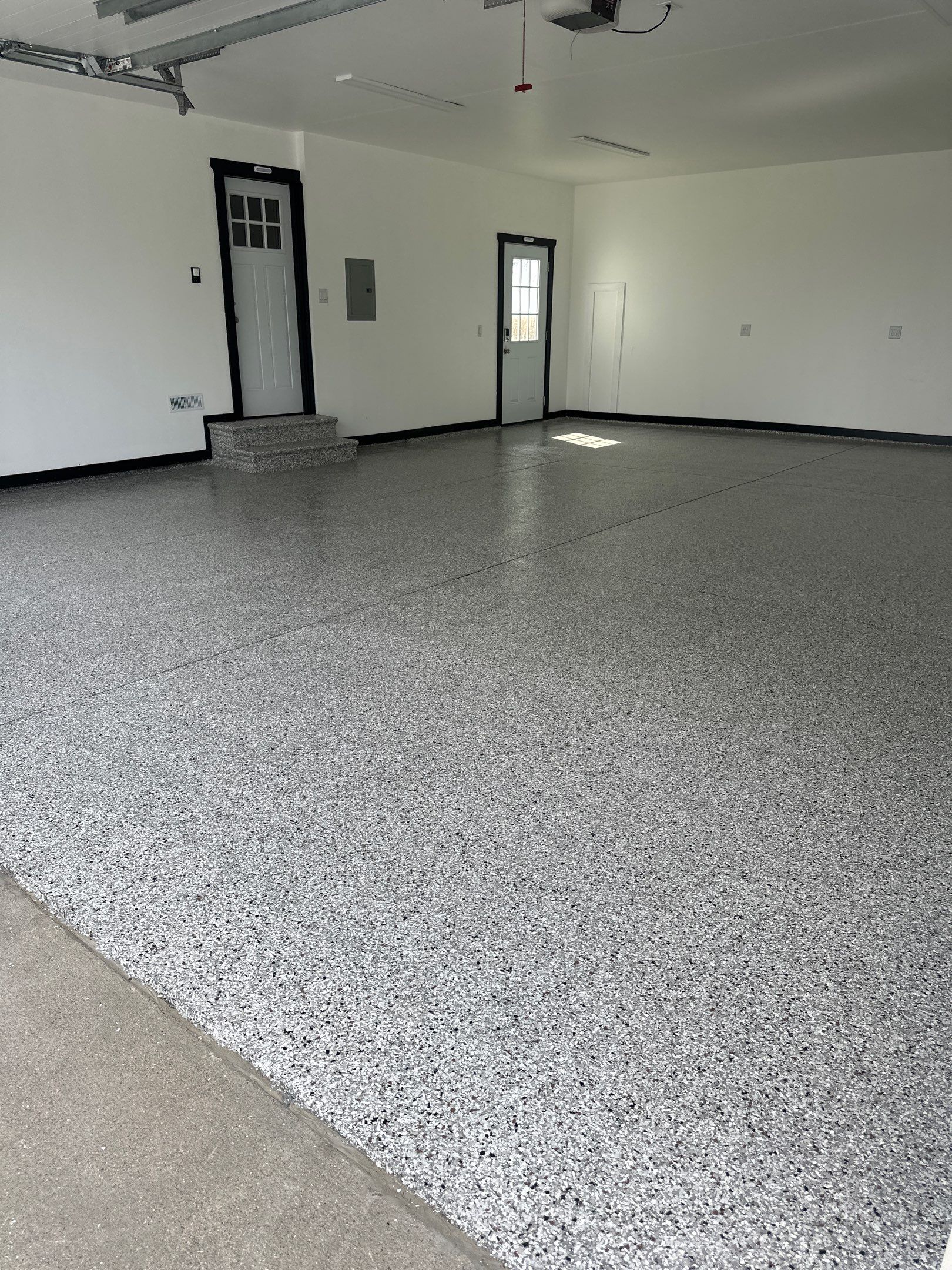 New Indianola Garage Floor Prepped for Winter! by Revival Concrete Coatings, LLC