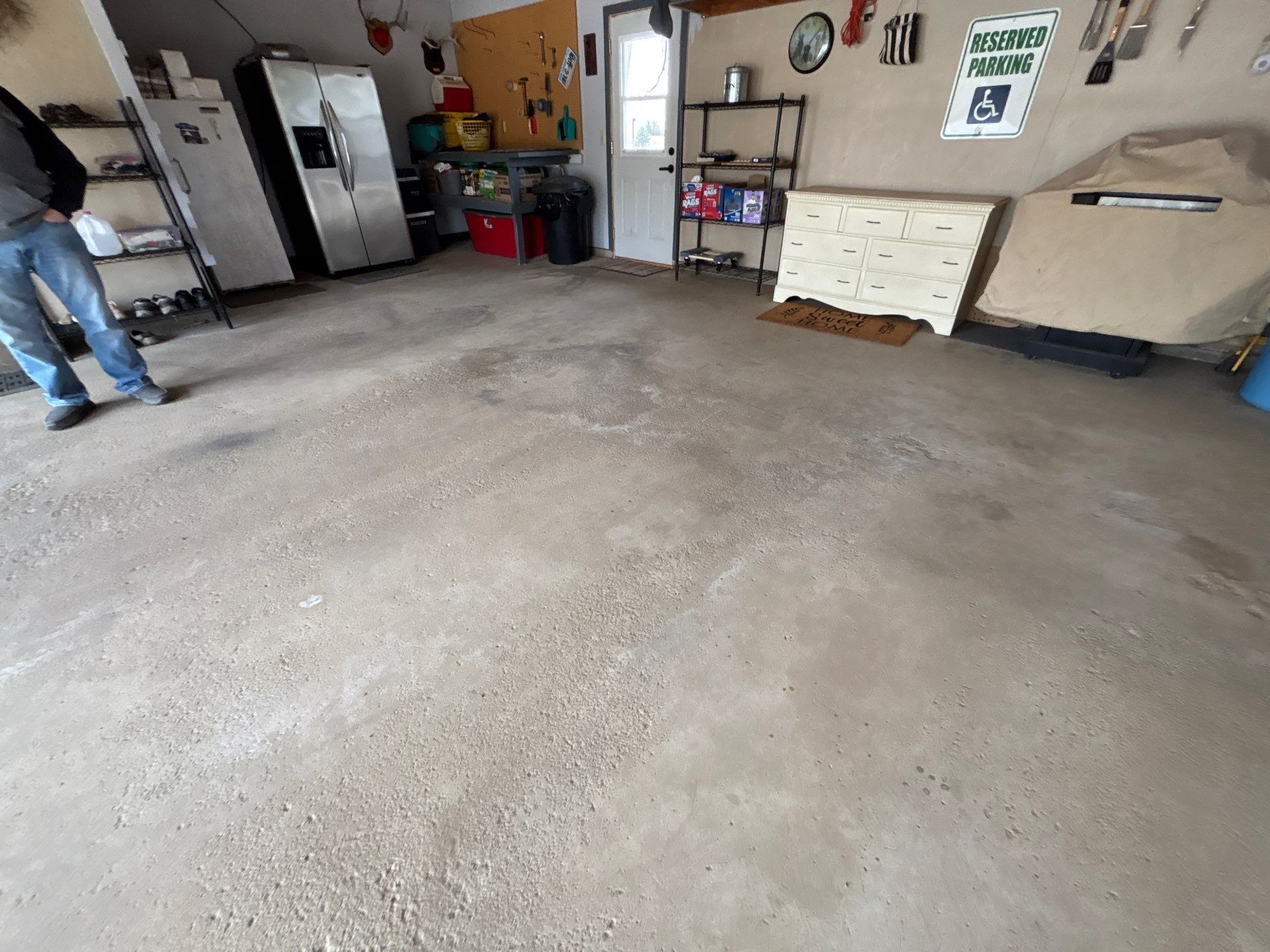 Full-Flake Epoxy Garage Floor Coating Installation in Sioux Falls by Select Painting, Coatings & Garage Cabinets