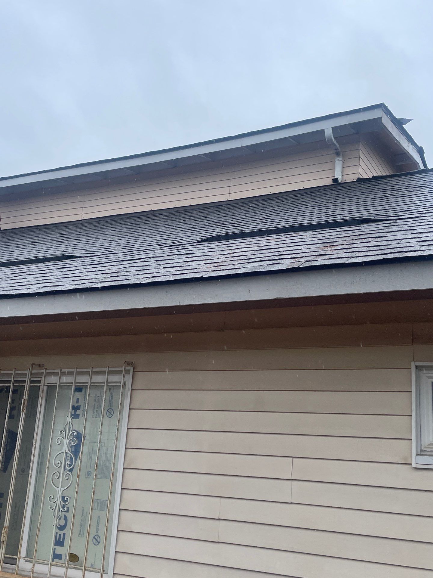 Reroof, Gutters, and Repair by Hawthorne General Construction