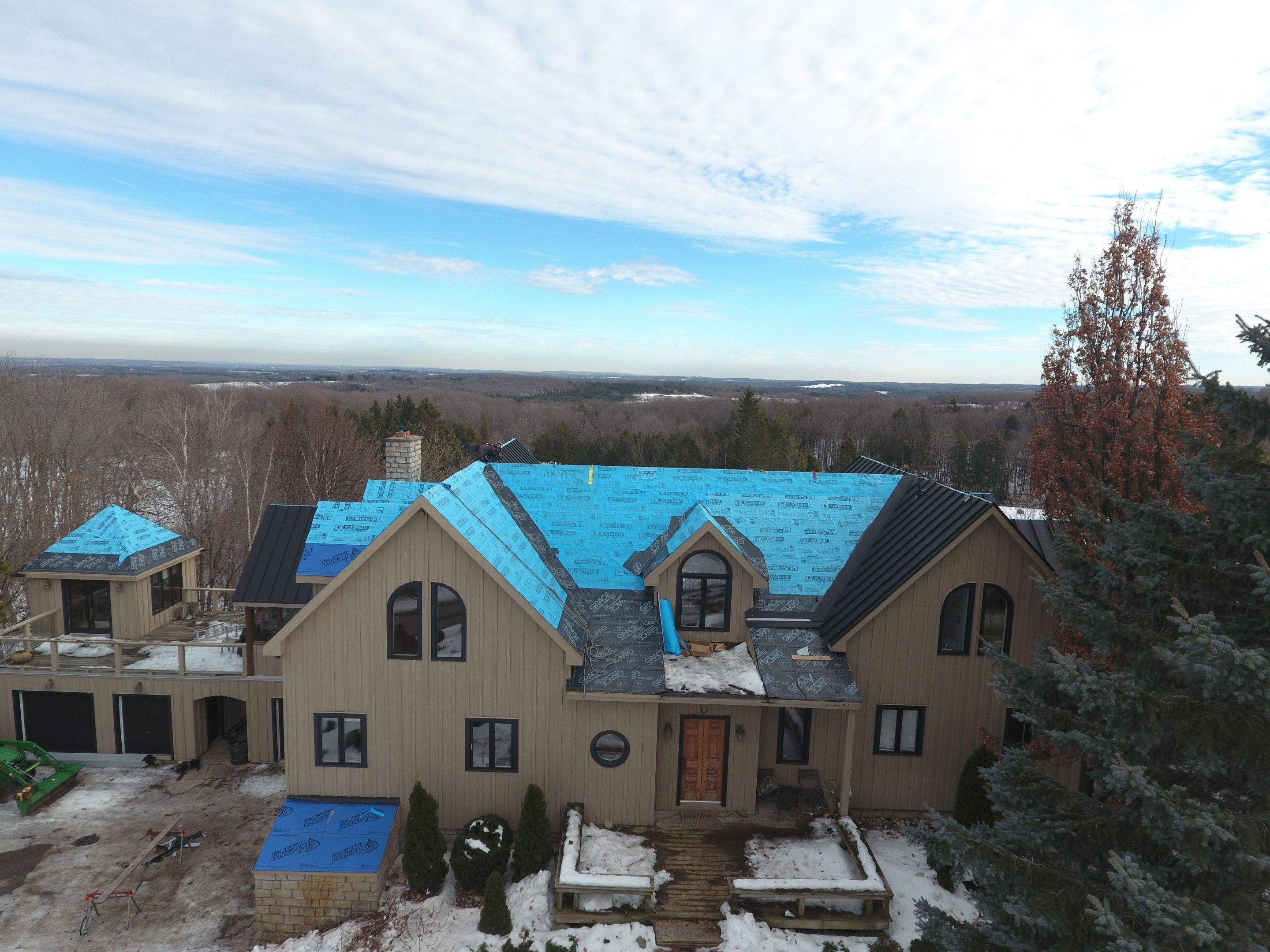 Residential Roofing Installation using 24 Ga Standing Seam Metal by Jay Carter Roofing & Sheet Metal