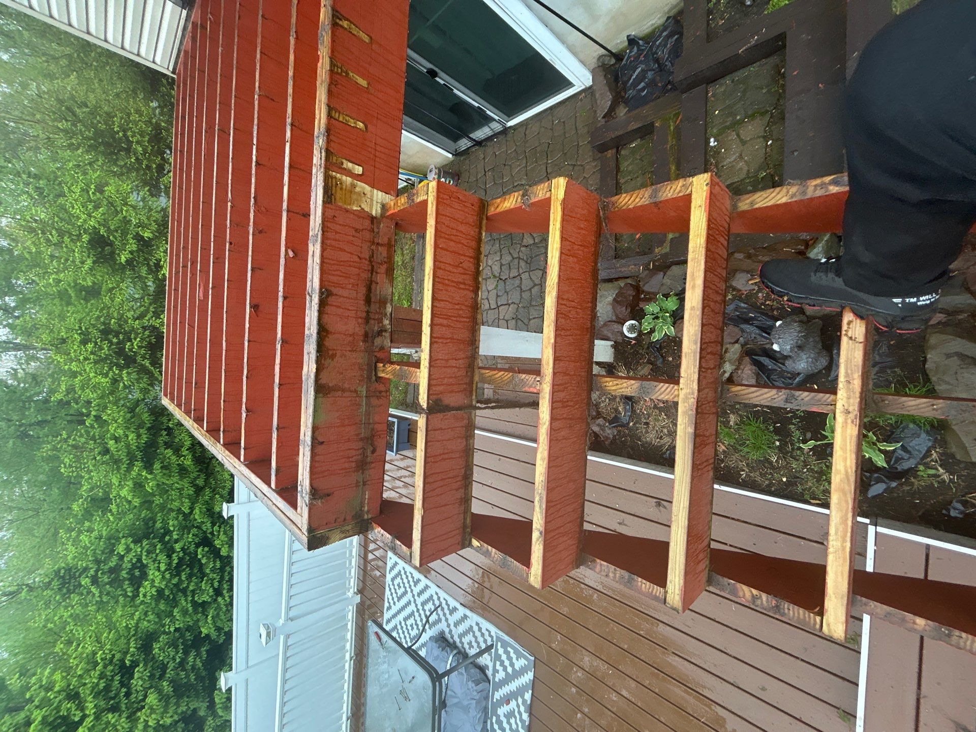 Elevated Composite Deck Replacement with White Railing in Tannersville by Herts Roofing & Construction