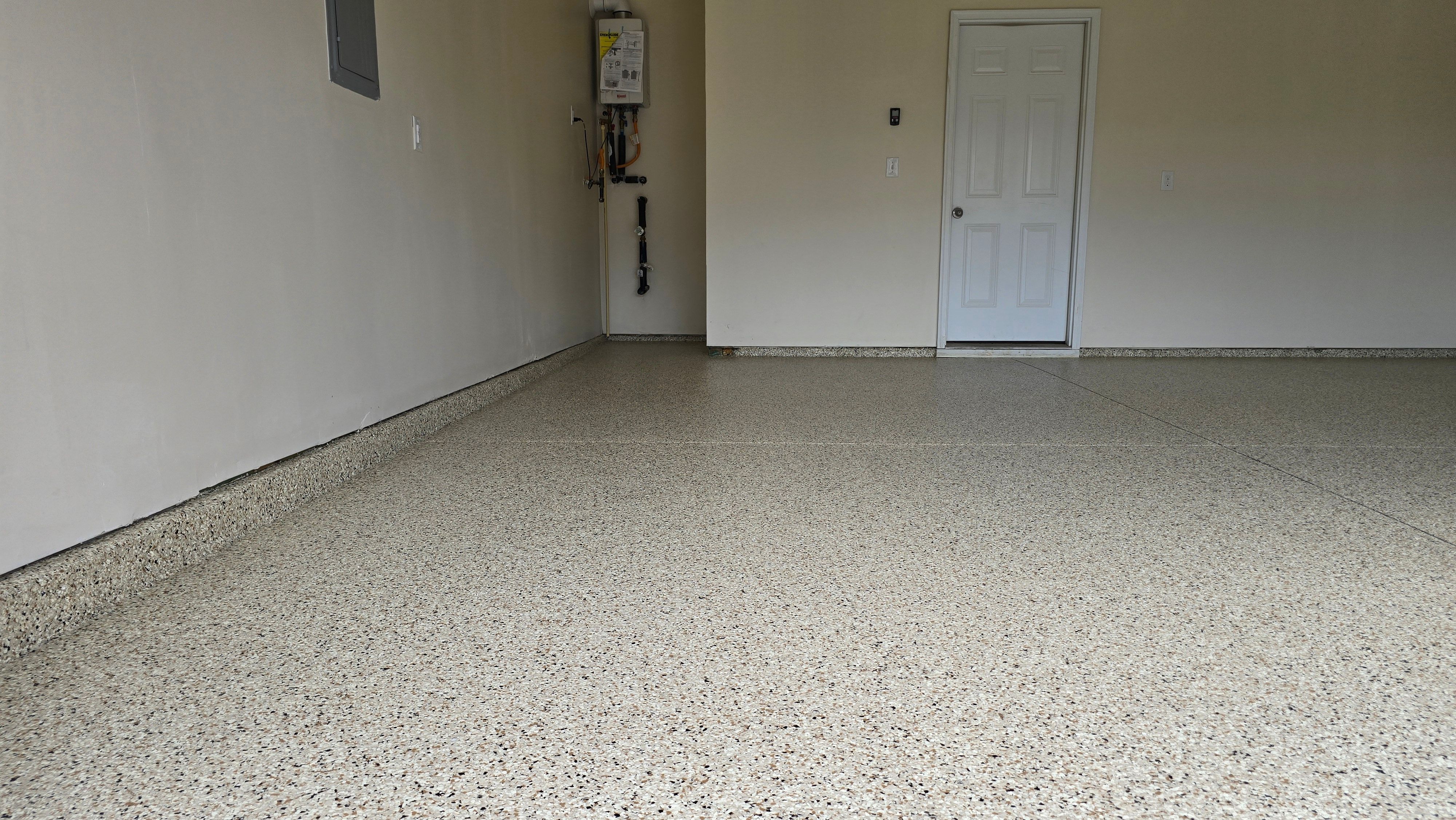 Garage & Back Porch Using Shoreline & Coyote by Elite Floor Solutions