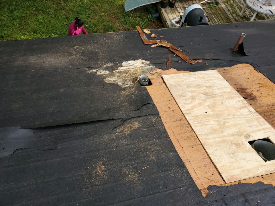 Residential Roofing Repair using Roof Replacement by American Roofing & Construction LLC