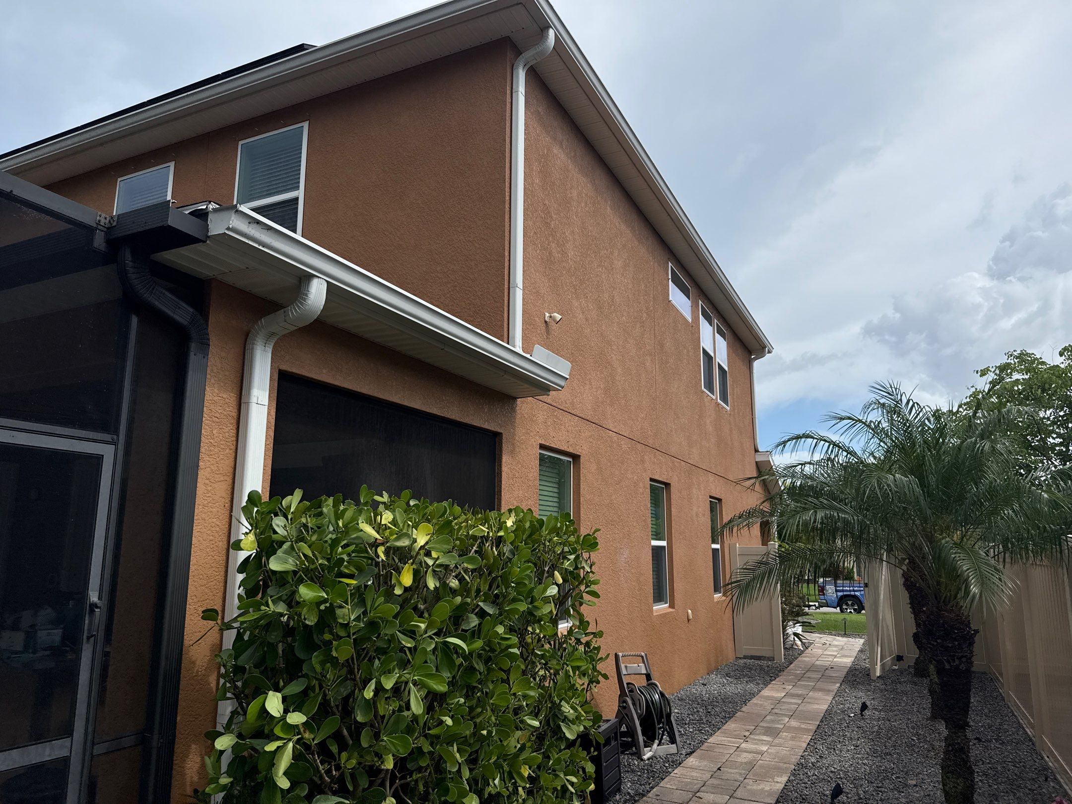 Full Exterior Cleaning – Two-Story House, Gutters, and Fence in Old Mill Preserve, Palmetto, FL by Sunshine AquaWash