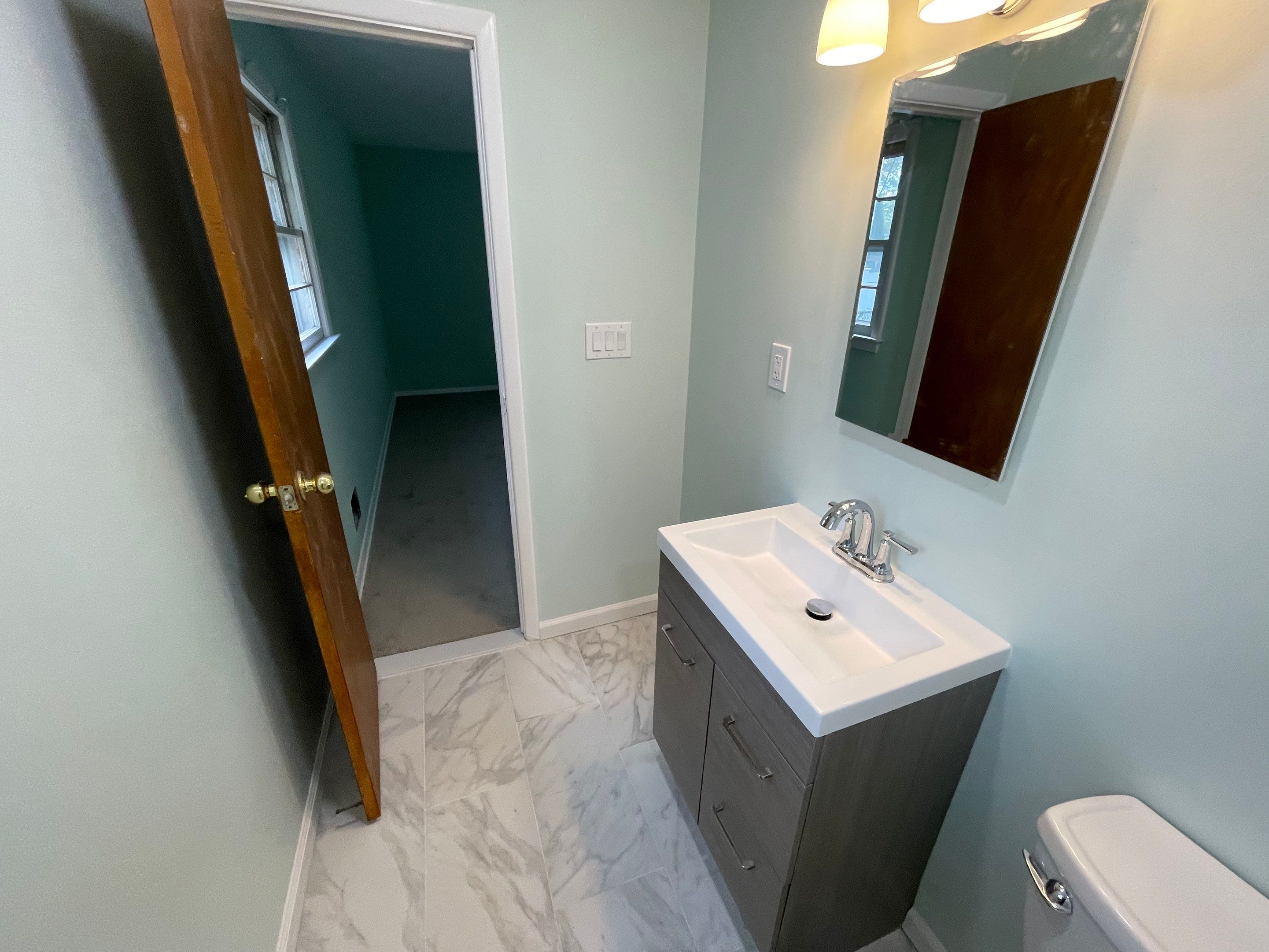 Bathroom Remodel using Tile by Home Concepts Construction
