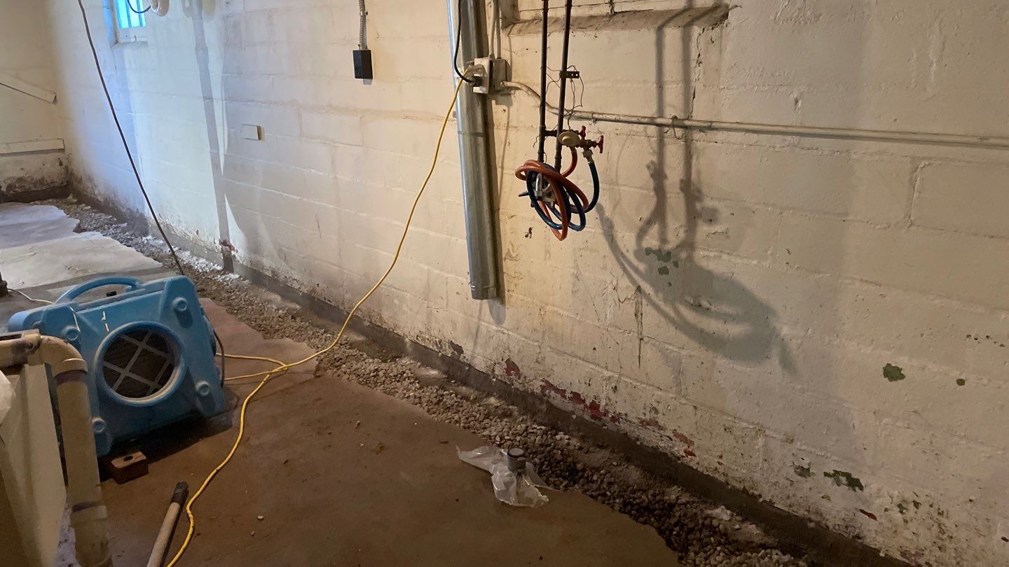 Interior Drain Tile & Sump Pump System in North Minneapolis by Waterproofing Northeast
