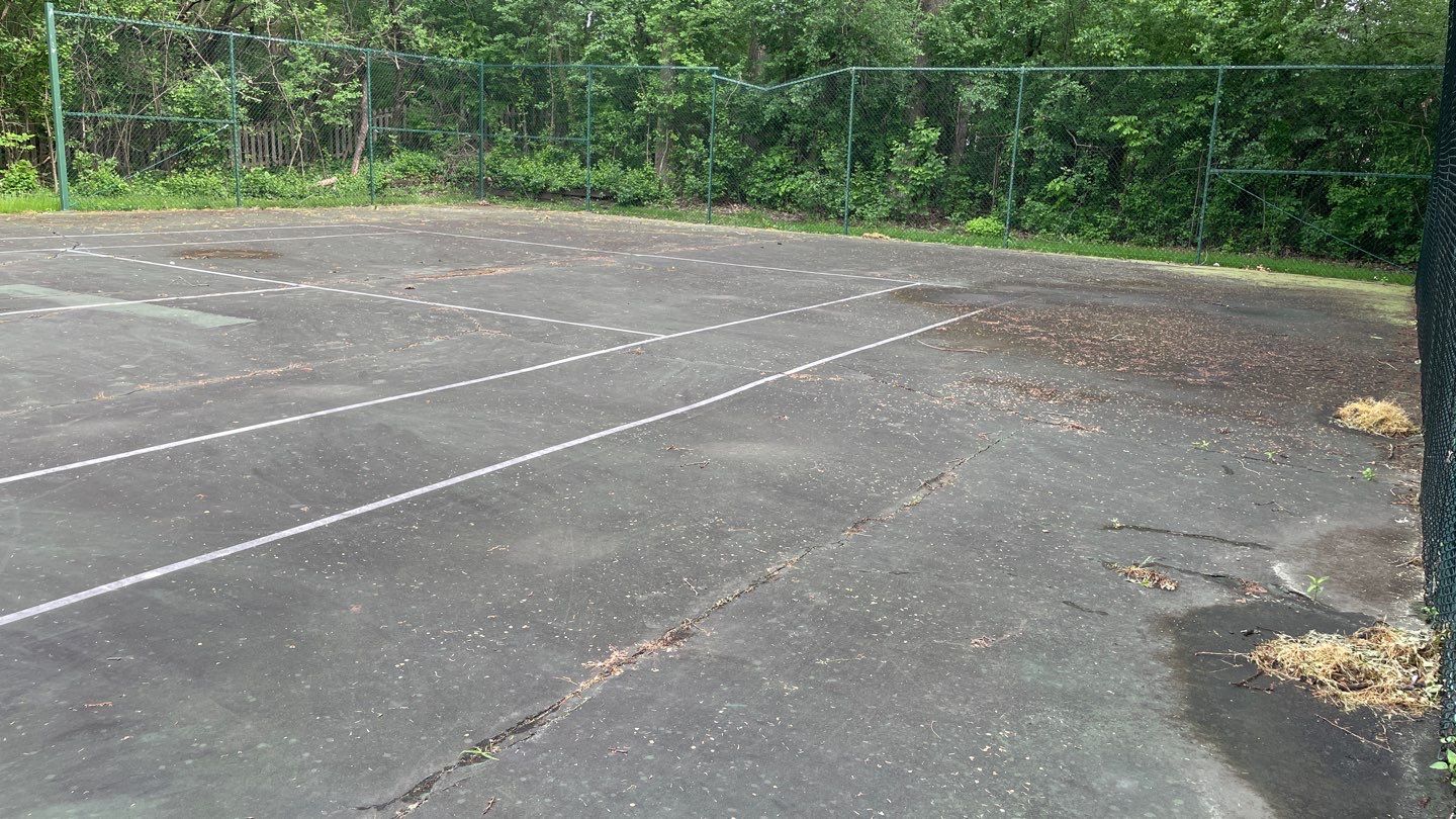Tennis Court using Algaecide, soft wash soap by Northern Power Washing LLC.