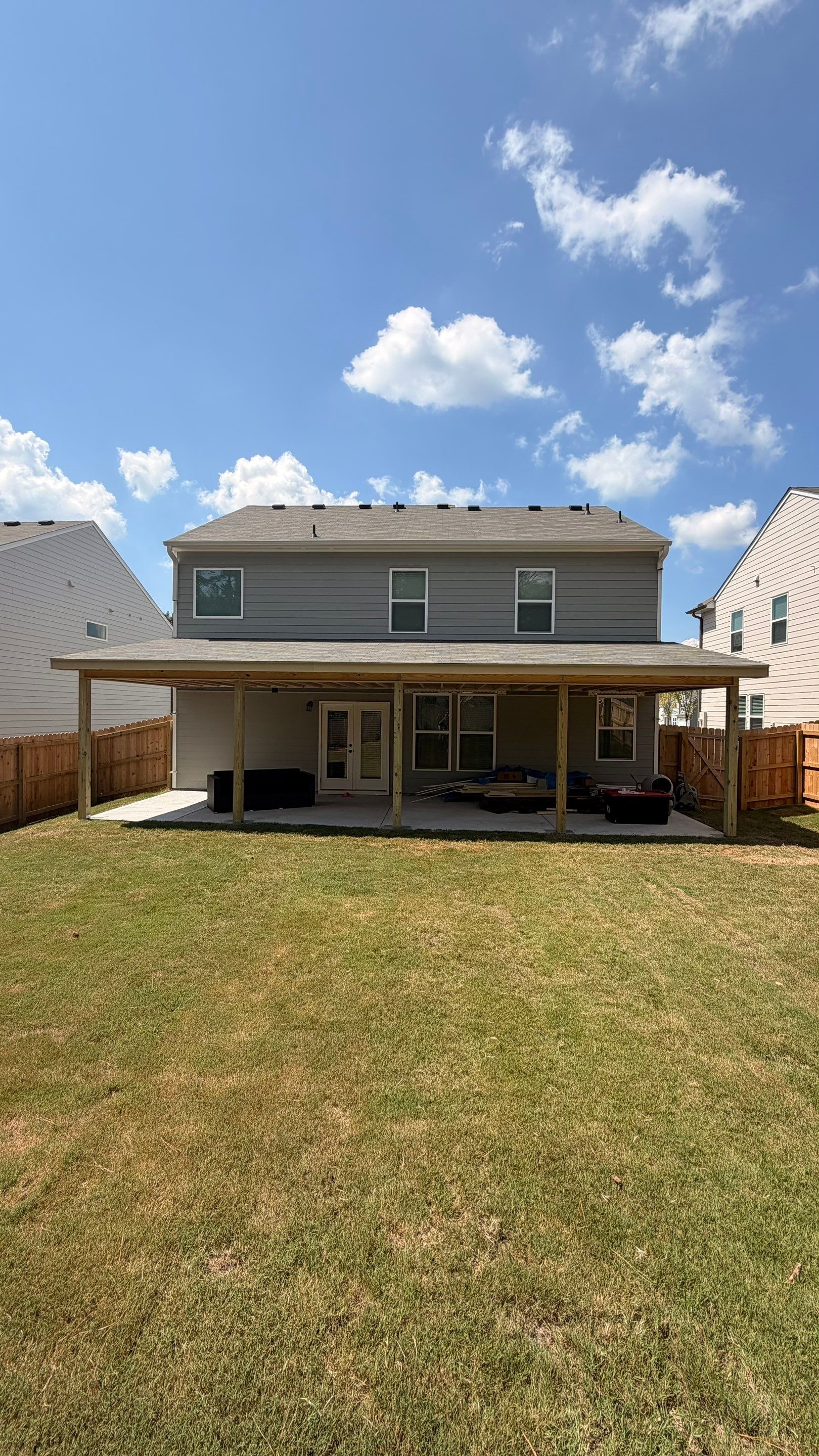 Custom Covered Back Porch with Privacy Screening in Acworth by Swift Home Renovations 