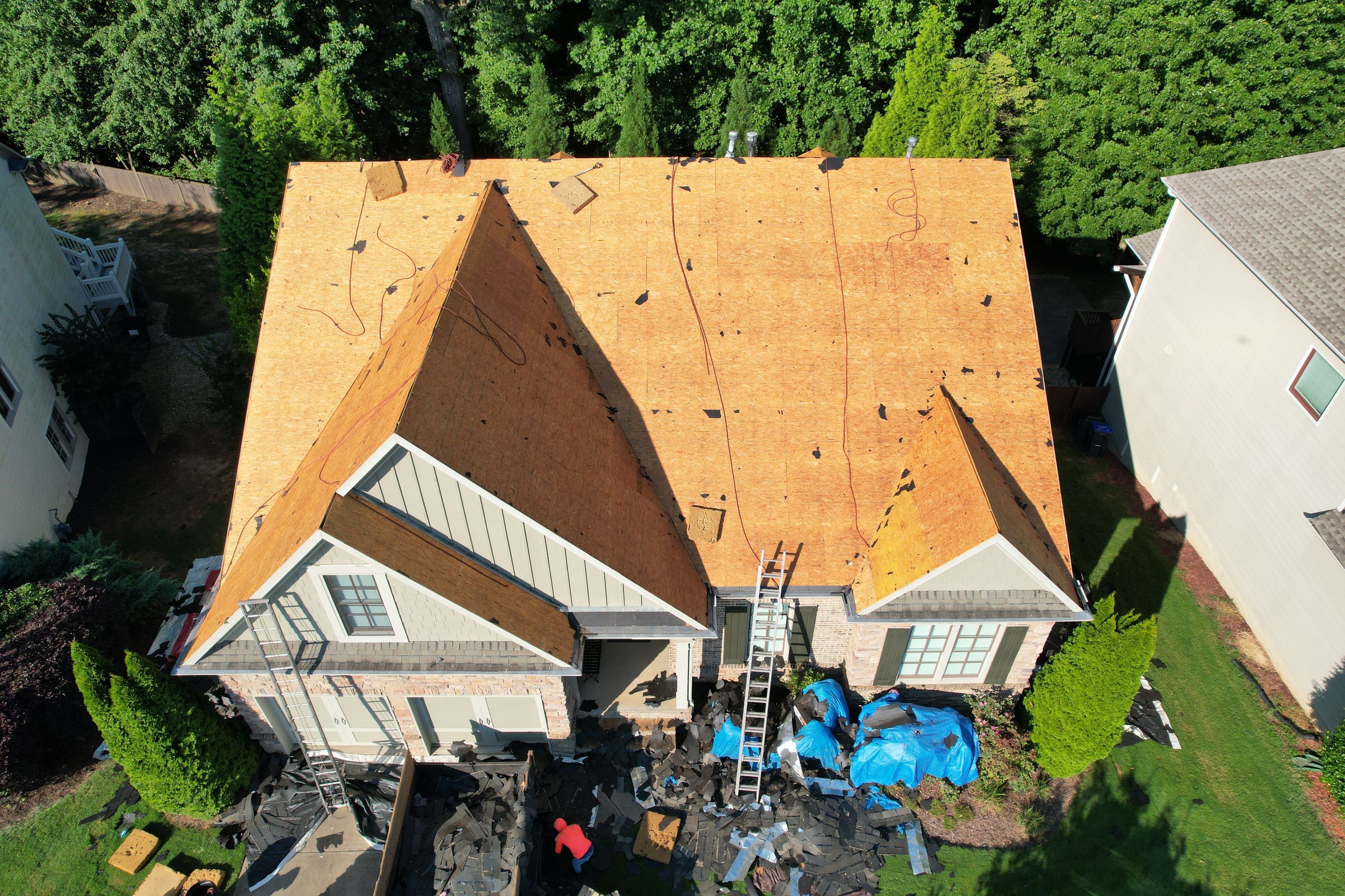 Residential Roofing Installation using Owens Corning Quary Gray by Inspector Roofing and Restoration