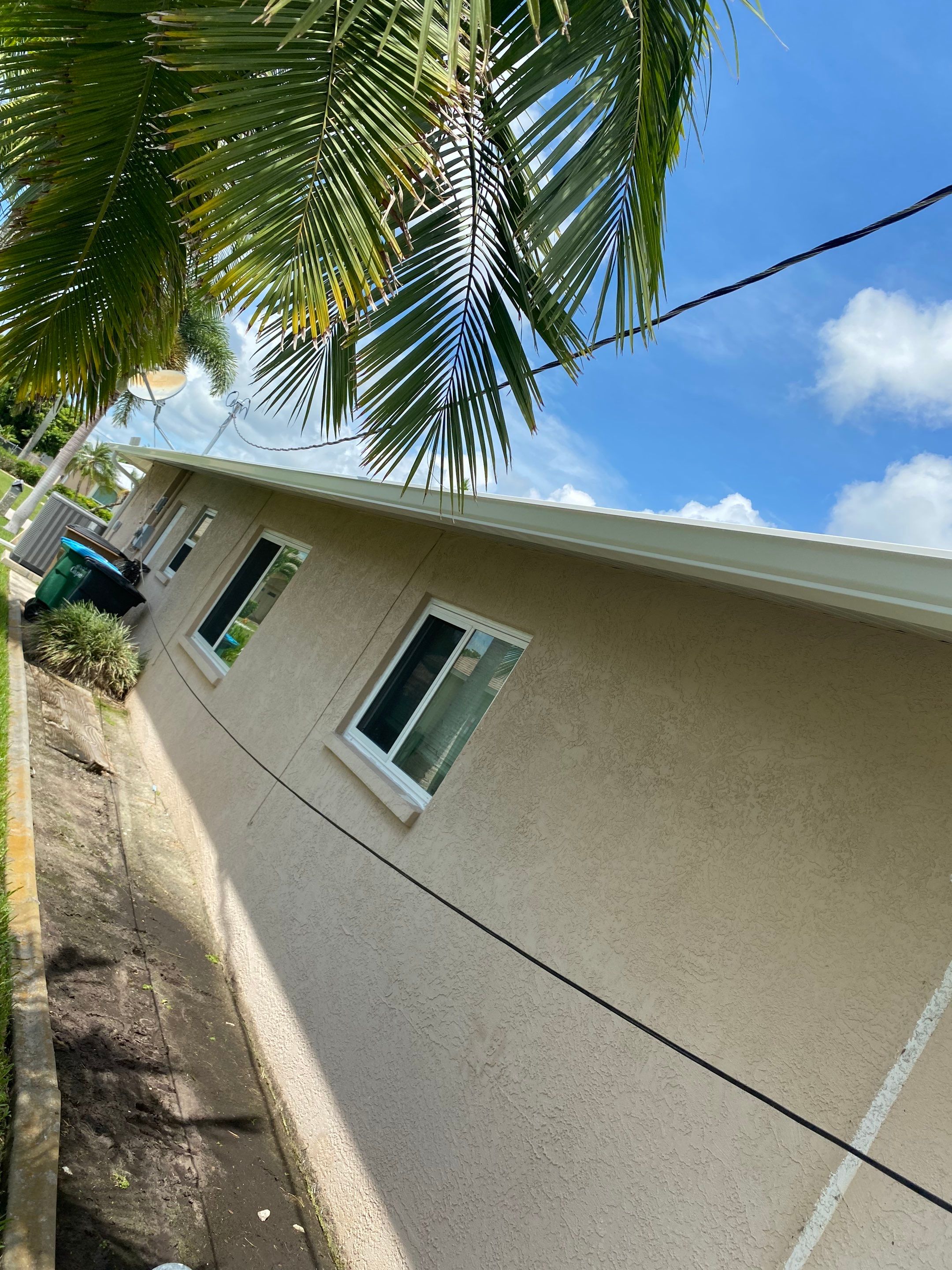 Seamless Gutters for Buildings in Cape Coral FL by Gutter Professors