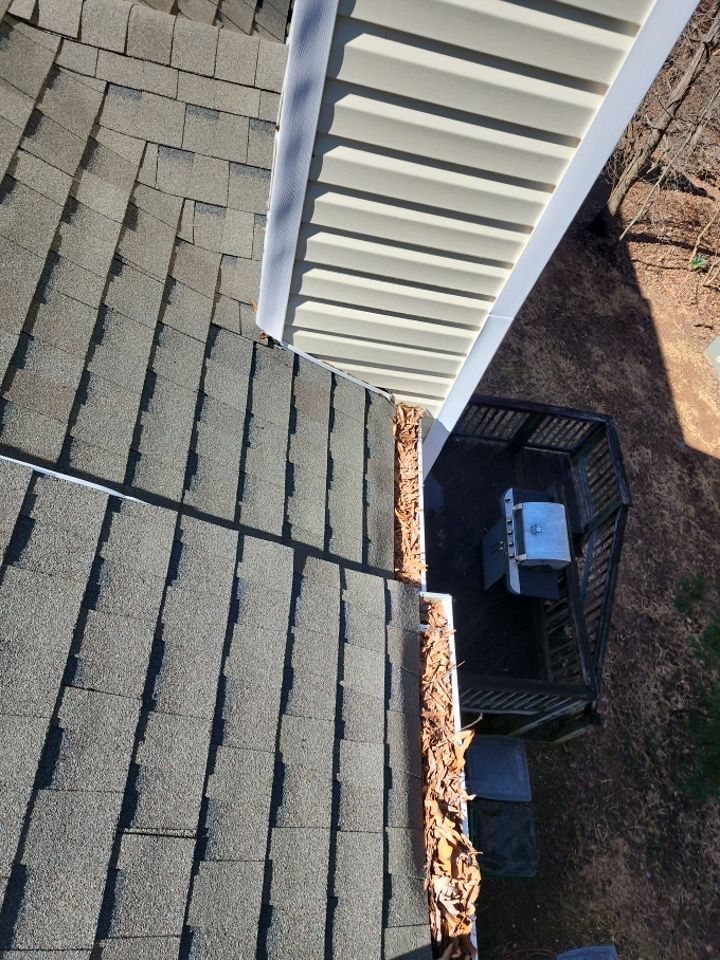 Gutter Cleaning using water by G&H Home Tech Pros LLC