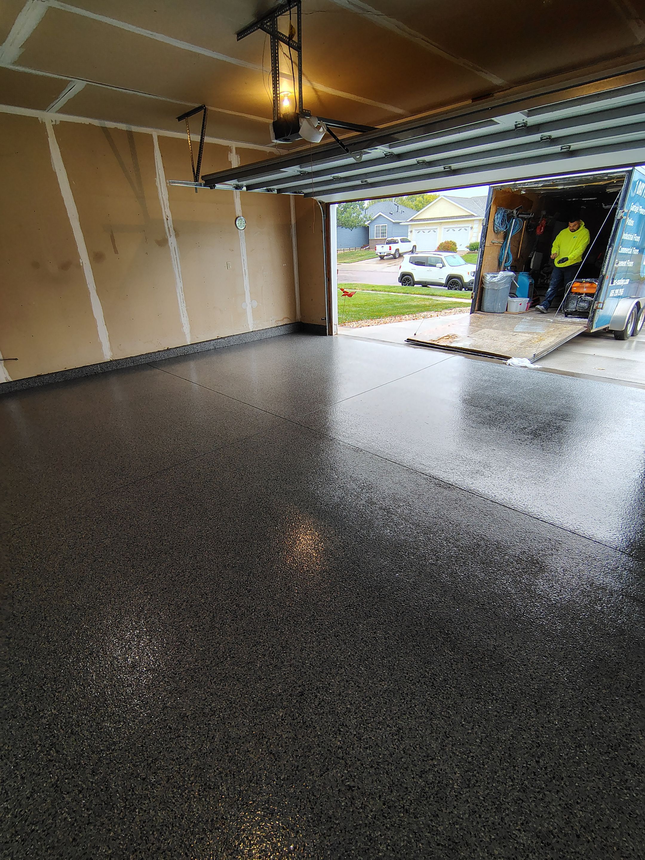 Nightfall Grey Speckled Epoxy Garage Floor Coating in Sioux Falls by Select Painting, Coatings & Garage Cabinets
