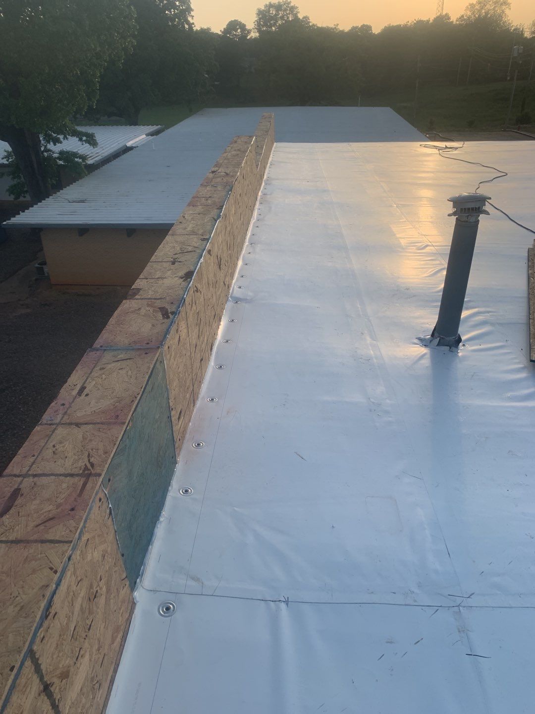 Commercial Roofing Installation using 50 mil PVC by Hostetler Roofing