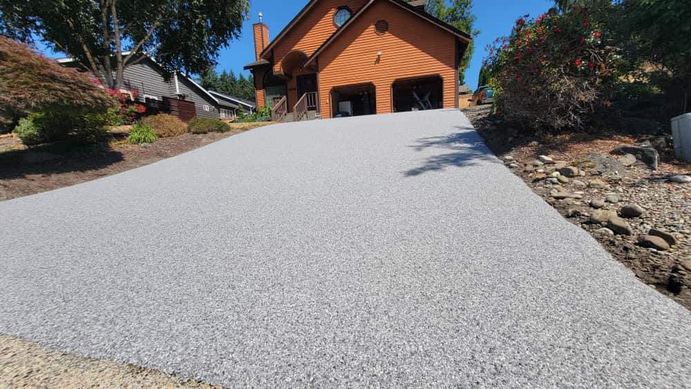Steep Driveway Strength in Poseidon Vuba Stone  by Concrete Coating Experts Inc.