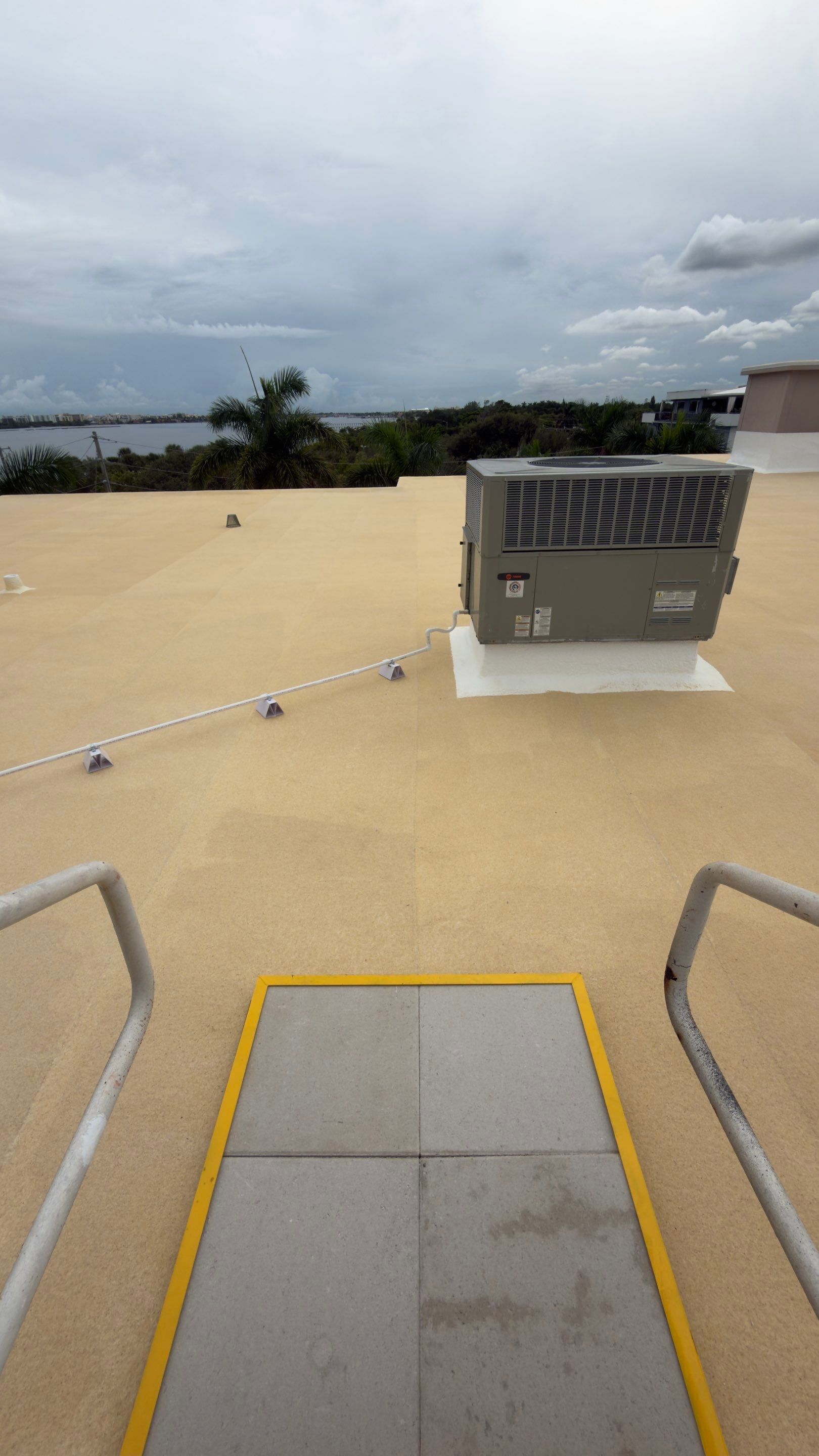 Commercial Roof Restoration for Lake Worth Beach Flat Roof Project by Roof King LLC