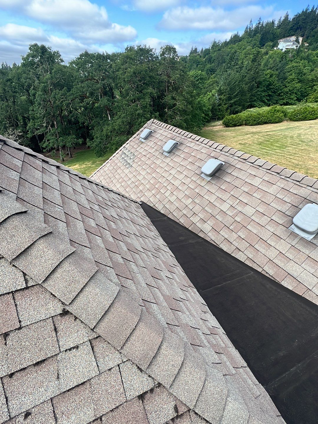 Residential Roofing Installation using Malarkey Windsor 50 Year Shingle (Color: Storm Grey) by Orezona Building & Roofing Company, Inc.