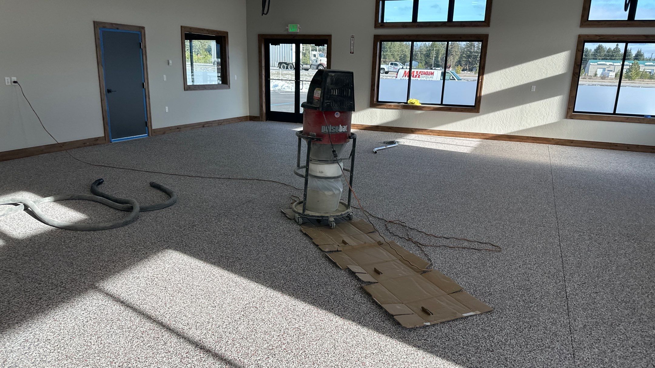 Maximum Exposure Commercial Floor using Domino w/ 5% Cherry Bomb Red  by Croc Coatings, LLC