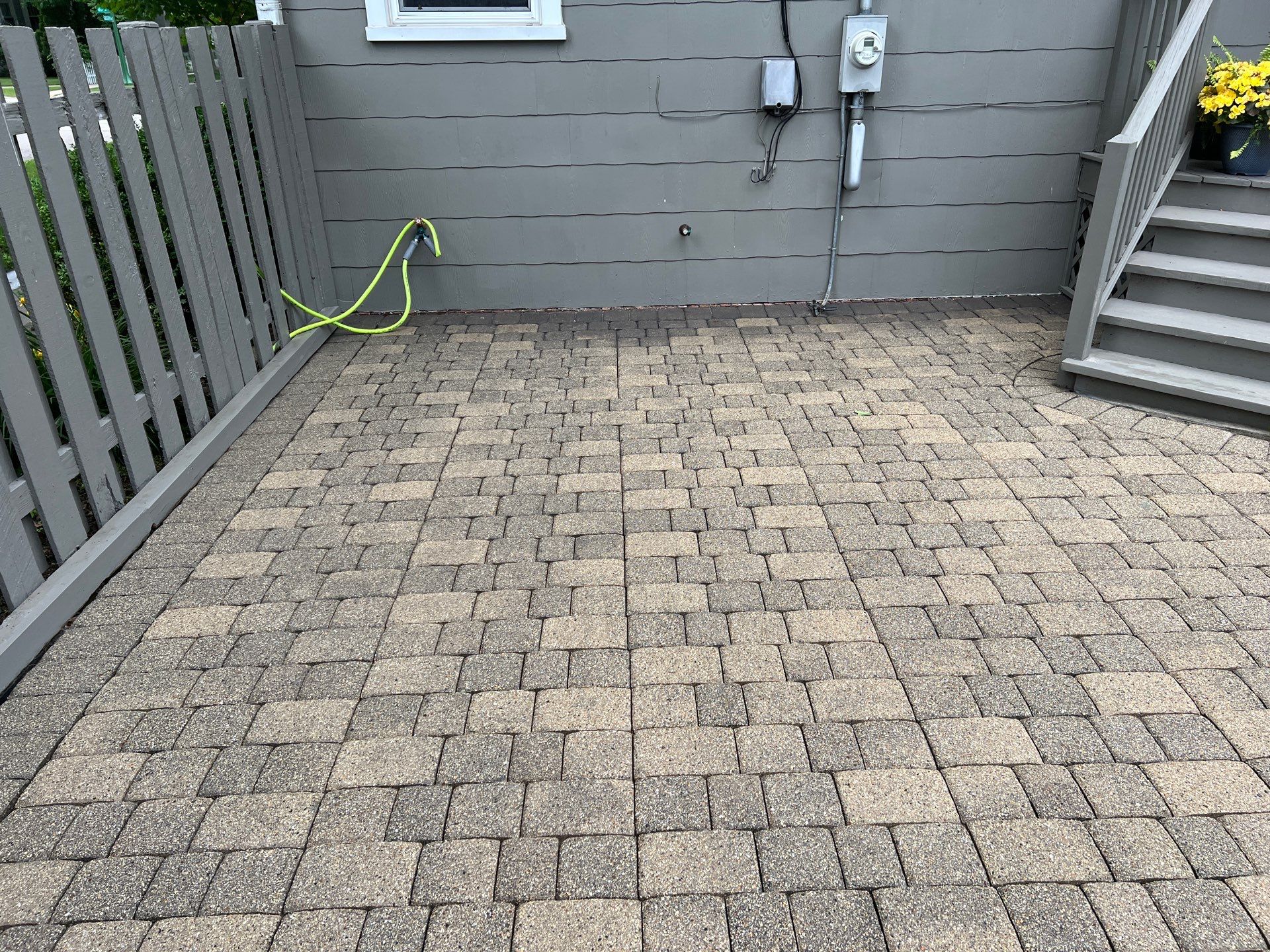 Brick paver cleaning and sealing by Northern Power Washing LLC.