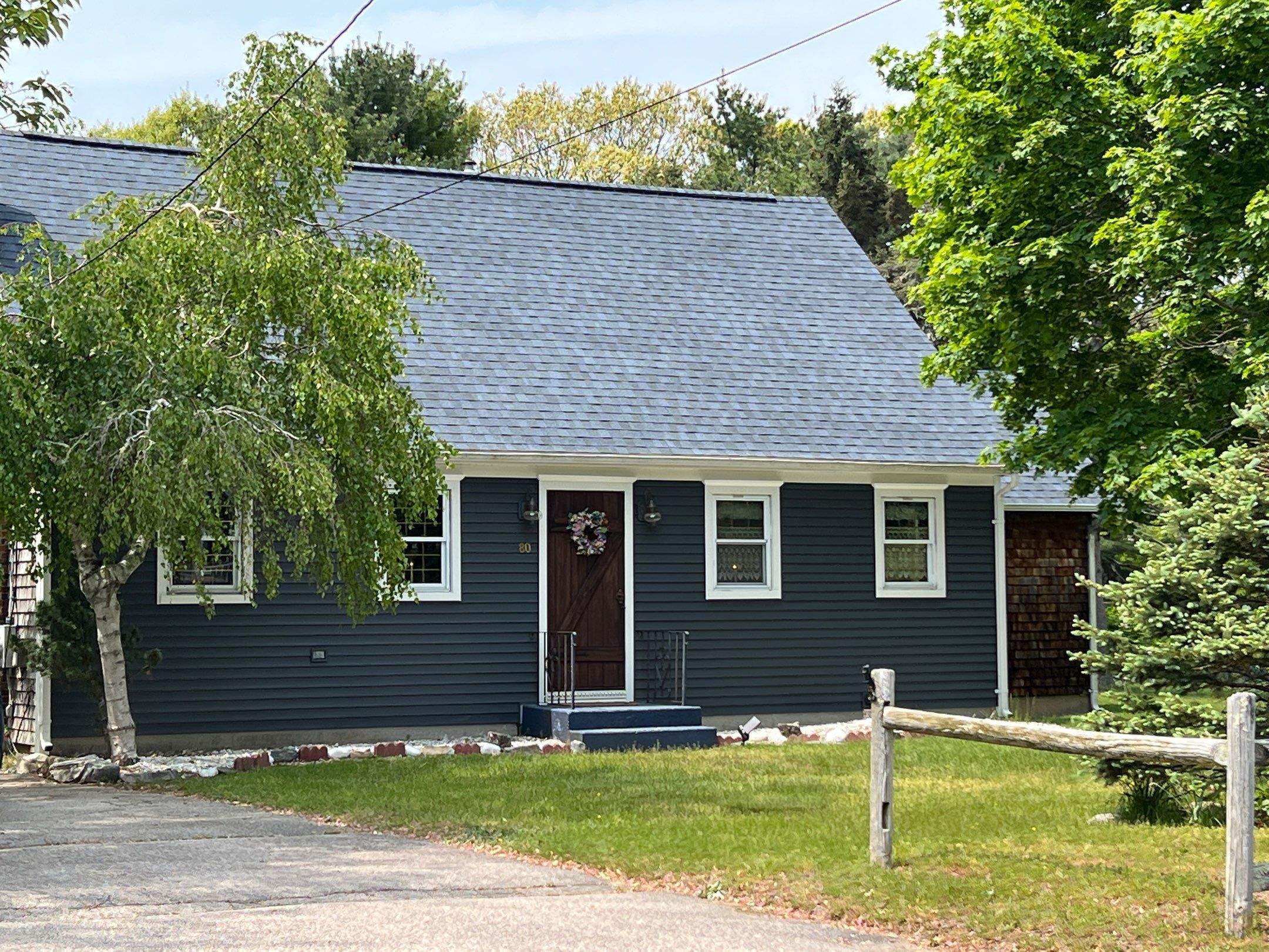 Coastal Blue Roofs by Pinnacle Roofing & Skylights