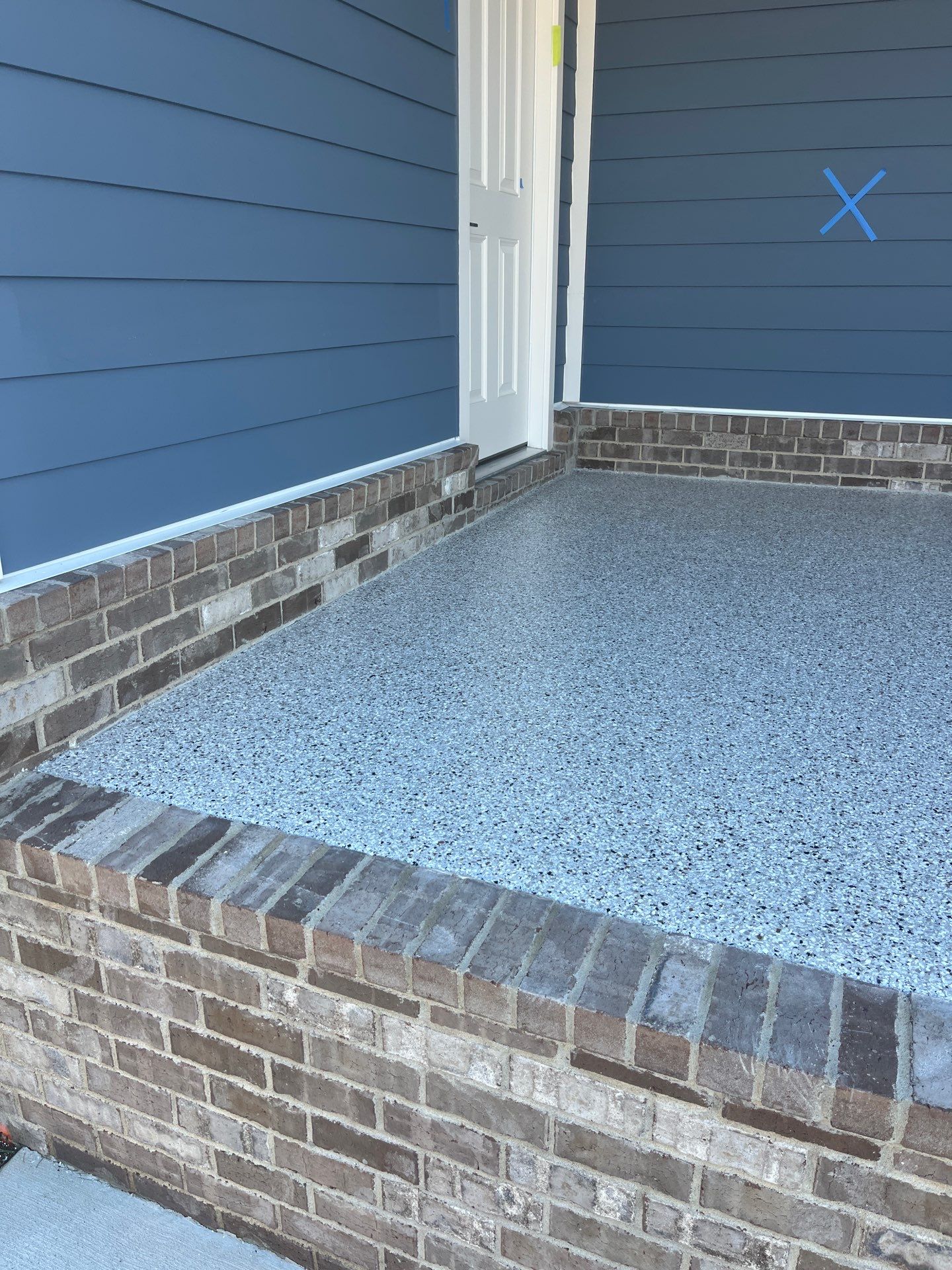 Patio Floor Coating using Coyote by My Garage Floor Guys